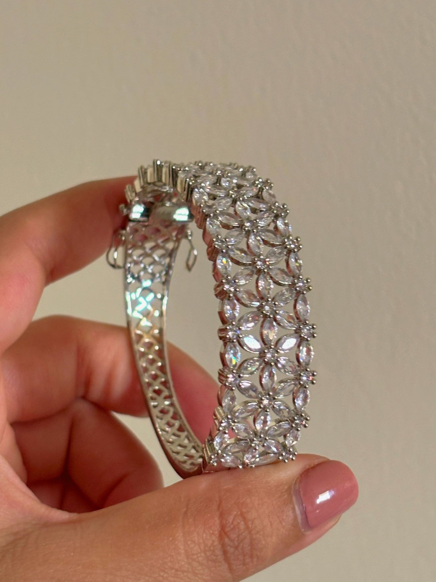 Shop Rhodium Plated Statement AD Bracelet In White online in India. Shop from an exclusive range of zircon jewellery, bridal wedding jewellery, silver plated earrings, rhodium plated rings, AD rings, AD earrings for weddings, engagement, cocktail night & parties.-front