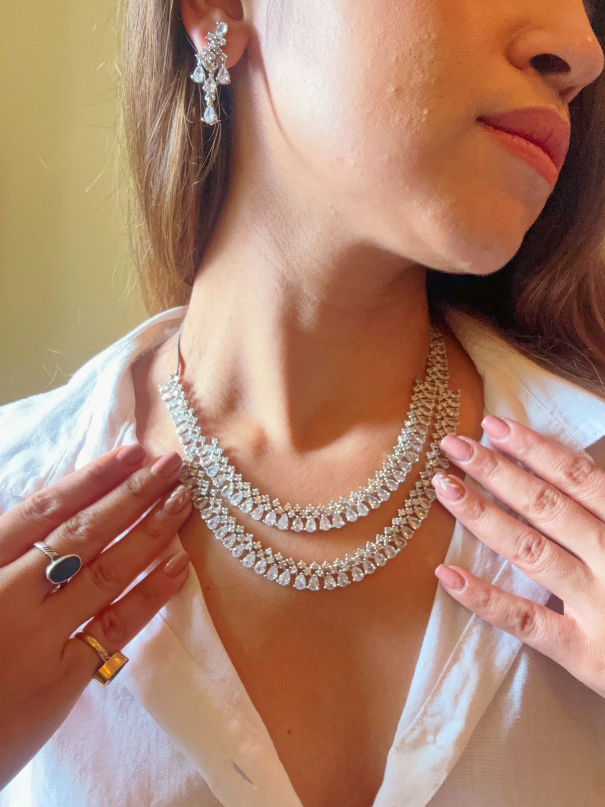 Shop Diamond Look bridal AD Necklace in India. Explore elegant bridal AD jewellery online. Shop premium bridal jewellery sets in Zircon, AD, Kundan, Victorian Diamond. Collection best suited for Indian weddings, parties and special occasions. Choose Diamond AD strings for sarees, lehengas and coats. -Side