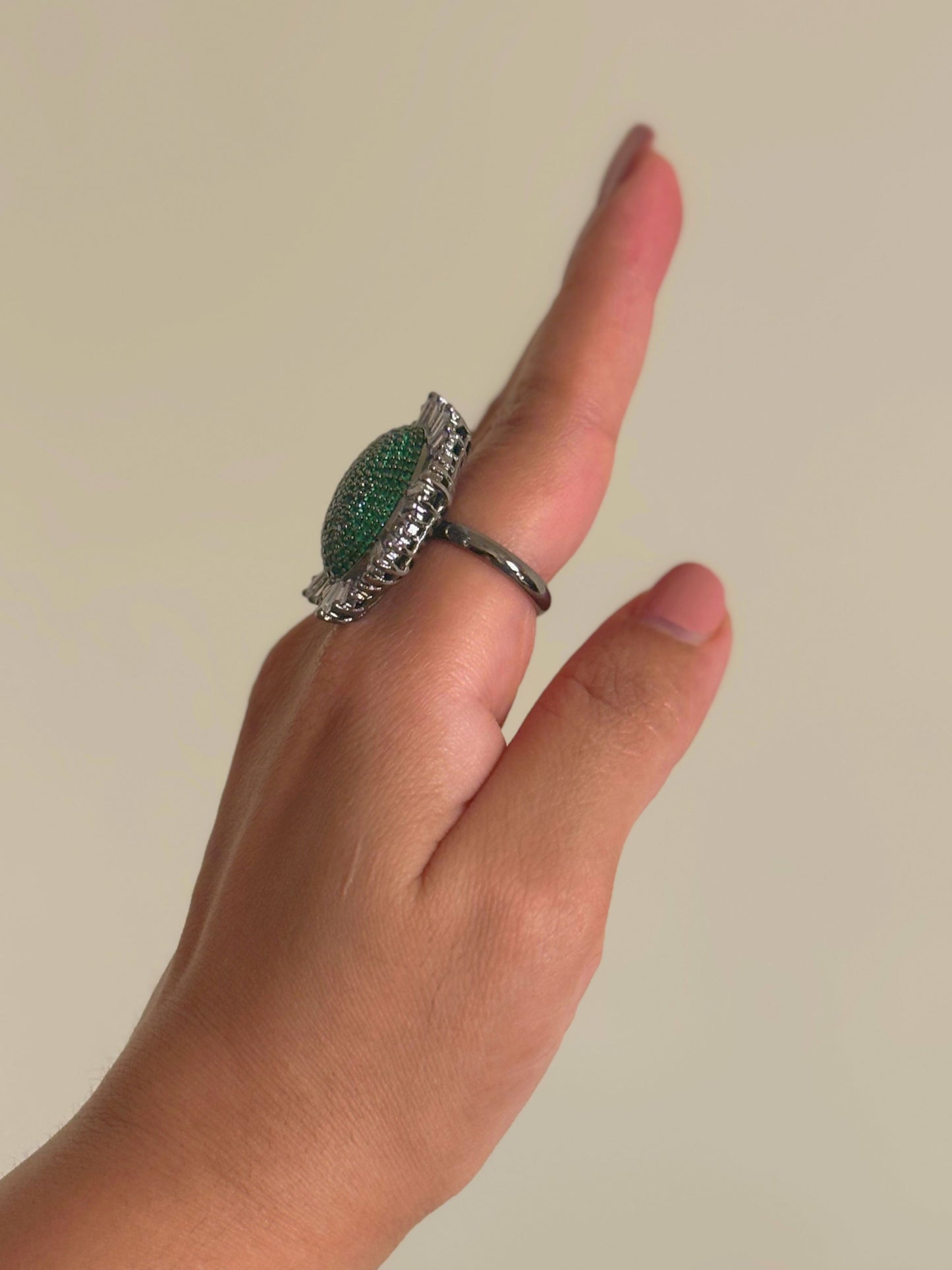 Shop Nano Setting Green Stone Cocktail AD Ring online in India. Shop from an exclusive range of zircon jewellery, bridal wedding jewellery, silver plated earrings, rhodium plated rings, AD rings, AD earrings for office parties, cocktail dresses and sangeet night. -side