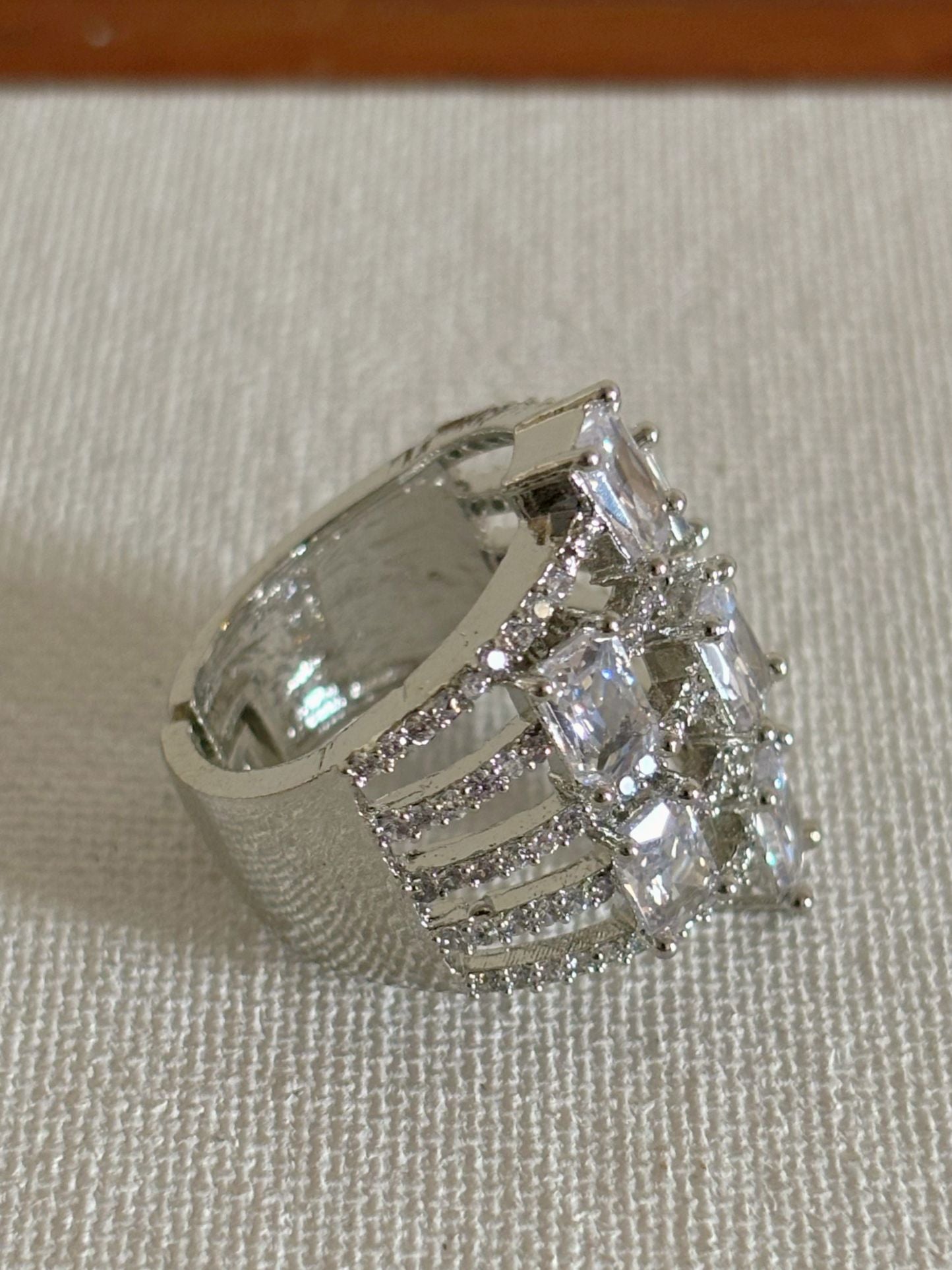 Shop Designer Baguette AD Cocktail Ring online in India. Shop from an exclusive range of zircon jewellery, bridal wedding jewellery, silver plated earrings, rhodium plated rings, AD rings, AD earrings for office parties, cocktail dresses and sangeet night. -back