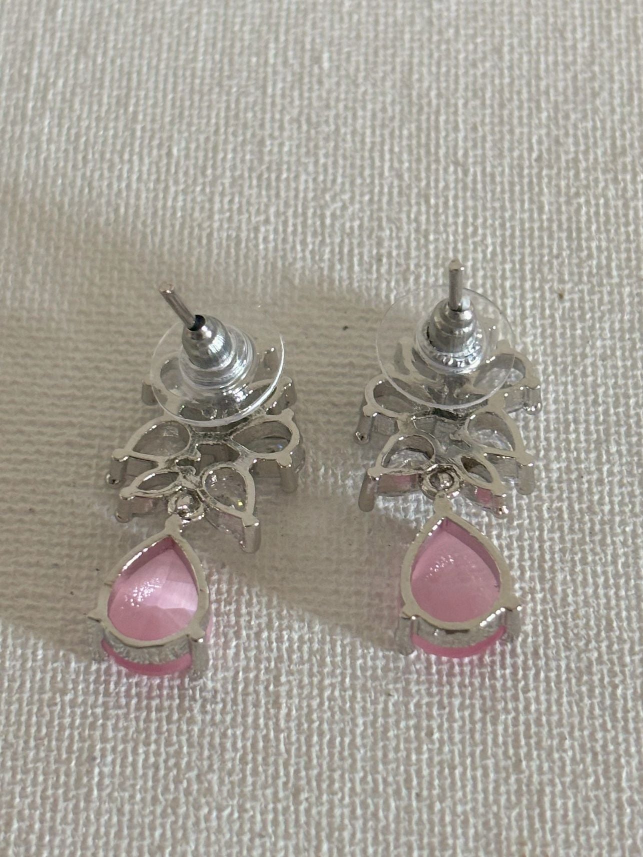 Shop Subtle Glow Pink Stone Drop AD Earrings online in India. Shop from an exclusive range of zircon jewellery, bridal wedding jewelry, silver plated earrings, rhodium plated jewellery, AD earrings, AD necklace sets for Lehengas, suits, sarees and gowns. -back