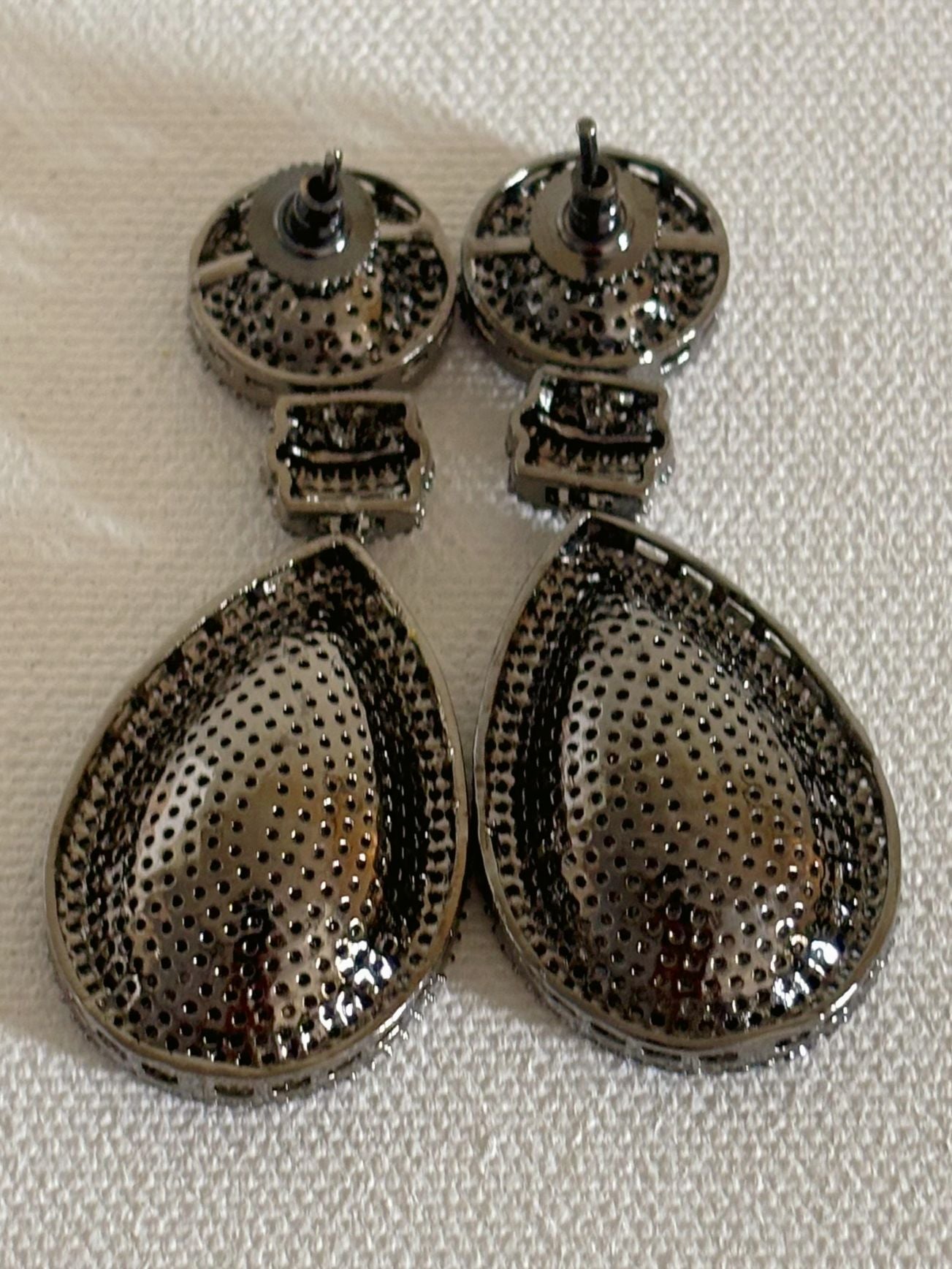 Shop women's Long Nano Setting AD Earrings In Golden online in India. Shop from an exclusive range of zircon jewellery, bridal wedding jewelry, silver plated earrings, rhodium plated jewellery, AD earrings, AD earrings sets for office parties, cocktail dresses and sangeet night. -back