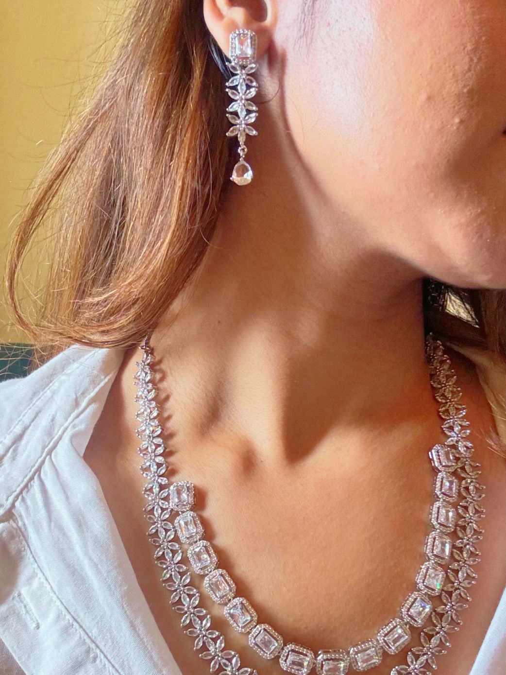 Shop Diamond Look bridal AD Necklace in India. Explore elegant bridal AD jewellery online. Shop premium bridal jewellery sets in Zircon, AD, Kundan, Victorian Diamond. Collection best suited for Indian weddings, parties and special occasions. Choose AD Necklace In White stone for sarees, lehengas and coats. -Side