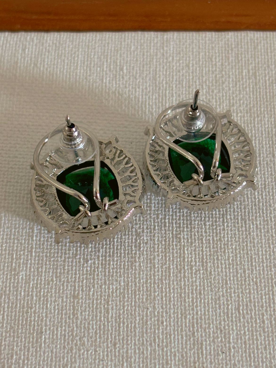 Shop Contemporary Studs In AD & Green Stone online. Shop from an exclusive range of zircon earrings, bridal AD jewelry, silver plated earrings, rhodium plated jewellery, AD earrings, AD necklace sets for weddings, engagements and parties. -back