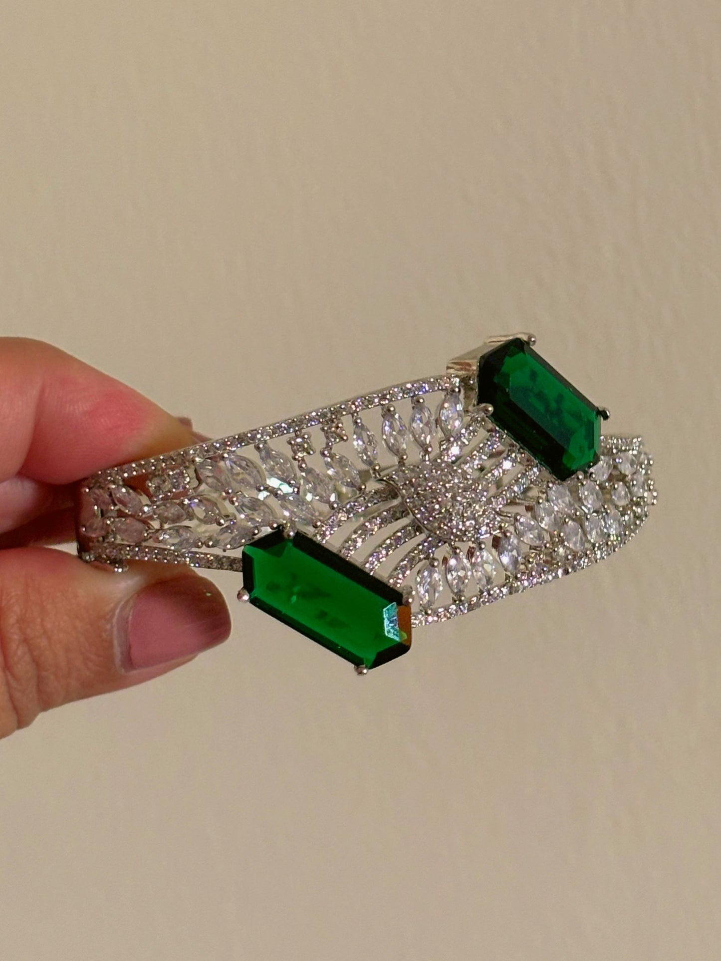 Shop BL25A010 Cocktail Night Statement AD Bracelet In Green online in India. Shop from an exclusive range of zircon jewellery, bridal wedding jewellery, silver plated earrings, rhodium plated rings, AD rings, AD earrings for weddings, engagement, cocktail night & parties. -side