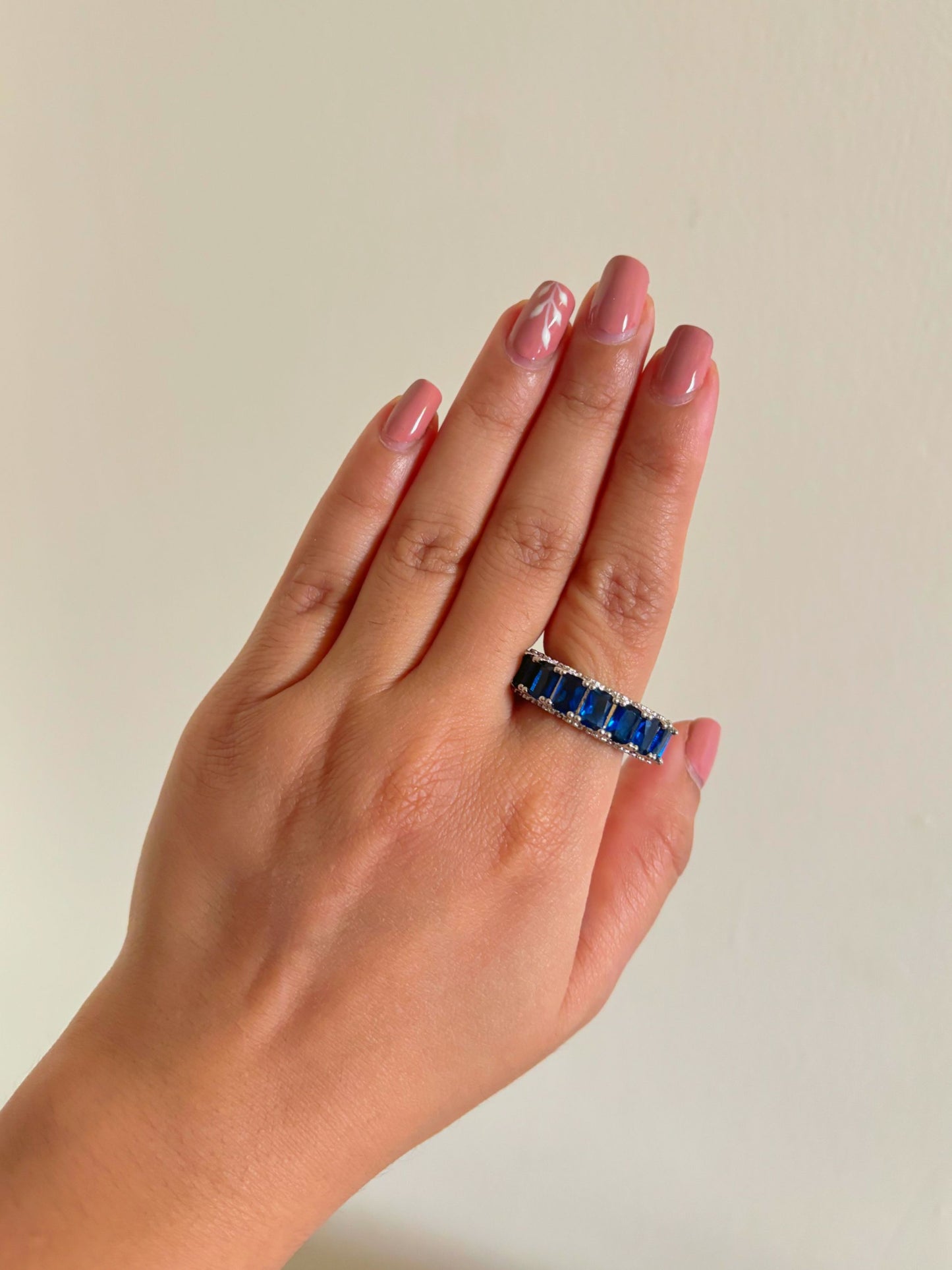 Shop Adjustable Green Baguette Stone Stack Ring online in India. Shop from an exclusive range of zircon jewellery, bridal wedding jewellery, silver plated earrings, rhodium plated rings, AD rings, AD earrings for office parties, cocktail dresses and sangeet night. -front