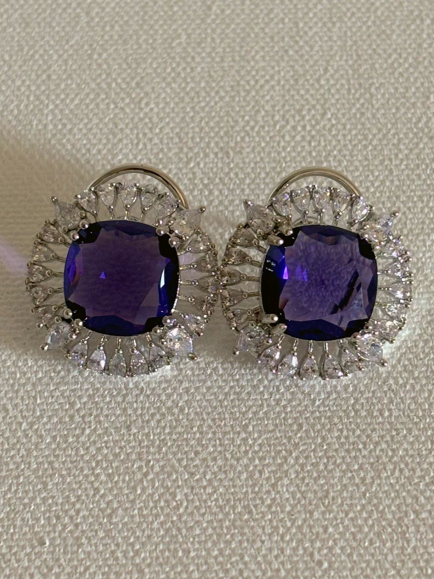 Shop Contemporary Studs In AD & Purple stone online. Shop from an exclusive range of zircon earrings, bridal AD jewelry, silver plated earrings, rhodium plated jewellery, AD earrings, AD necklace sets for weddings, engagements and parties. -first