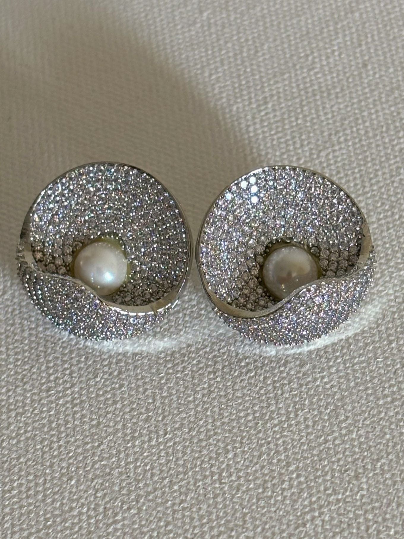 Shop women's stylish diamond look AD studs online in India. Shop from an exclusive range of zircon jewellery, bridal AD jewelry, silver plated earrings, rhodium plated jewellery, AD earrings, AD necklace sets for parties, engagement, cocktail and office events. -front