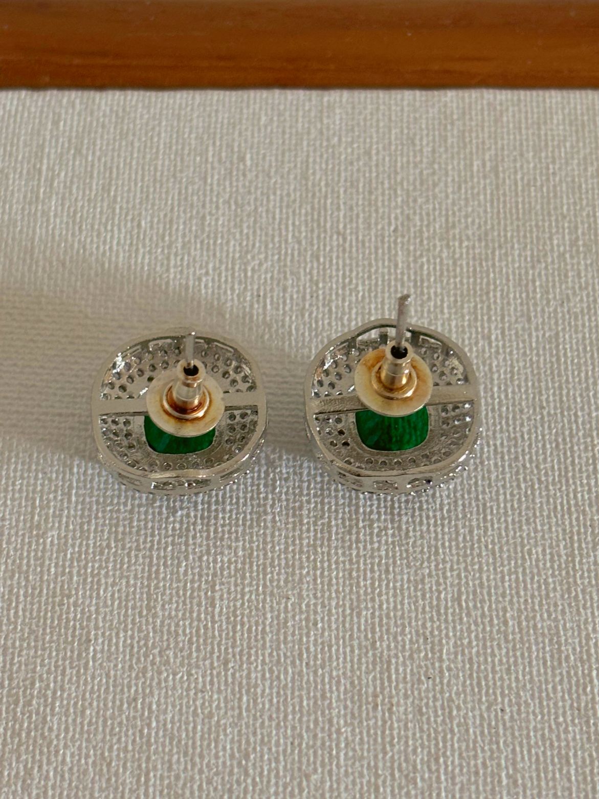 Shop AD jewellery online in India and US. Shop AD jewellery for sarees, lehengas, gowns & indo westerns. Bridal sets in AD, AD jewellery in green stone, AD bracelets in green stone available online. Buy AD studs in green stone online. -back