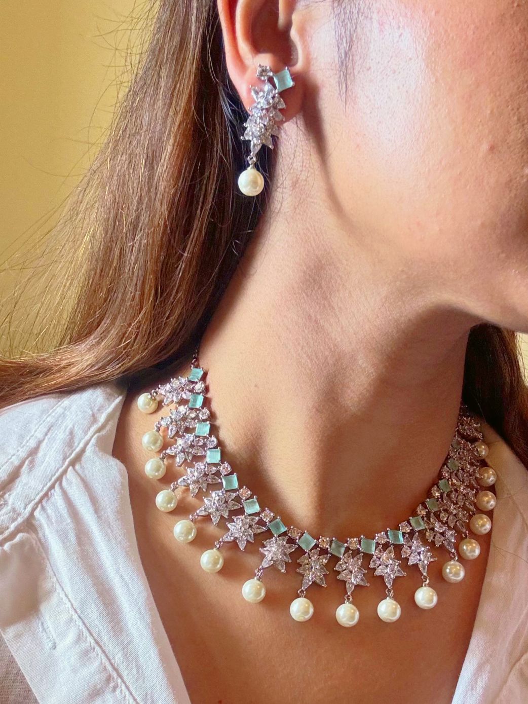 Shop Diamond Look AD Necklace in India. Explore elegant bridal AD jewellery online. Shop premium bridal jewellery sets in Zircon, AD, Kundan, Victorian Diamond. Collection best suited for Indian weddings, parties and special occasions. Choose Diamond AD strings for sarees, lehengas and coats. -Side