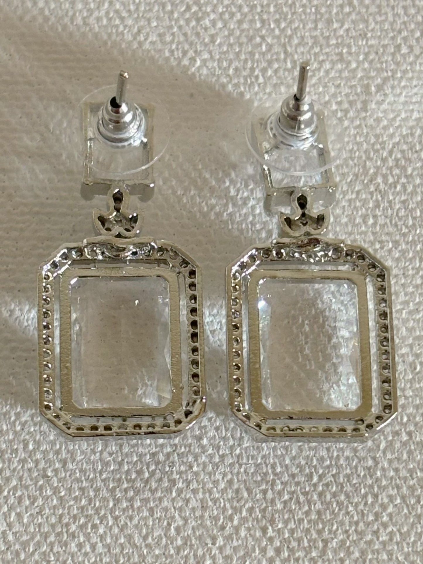 Shop women's luxury white doublet stone AD earrings online in India. Shop from an exclusive range of zircon jewellery, Indian wedding jewelry, gold plated earrings, rhodium plated jewellery, AD earrings, AD necklace sets for weddings and festive occasions. -back