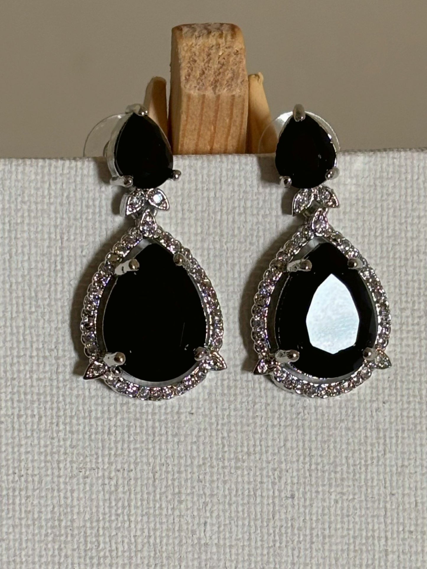 Shop Celebrity Look Double Drop Black Stone AD Earrings online. Shop from an exclusive range of zircon earrings, bridal AD jewelry, silver plated earrings, rhodium plated jewellery, AD earrings, AD necklace sets for coats, gowns and lehengas. -Upper