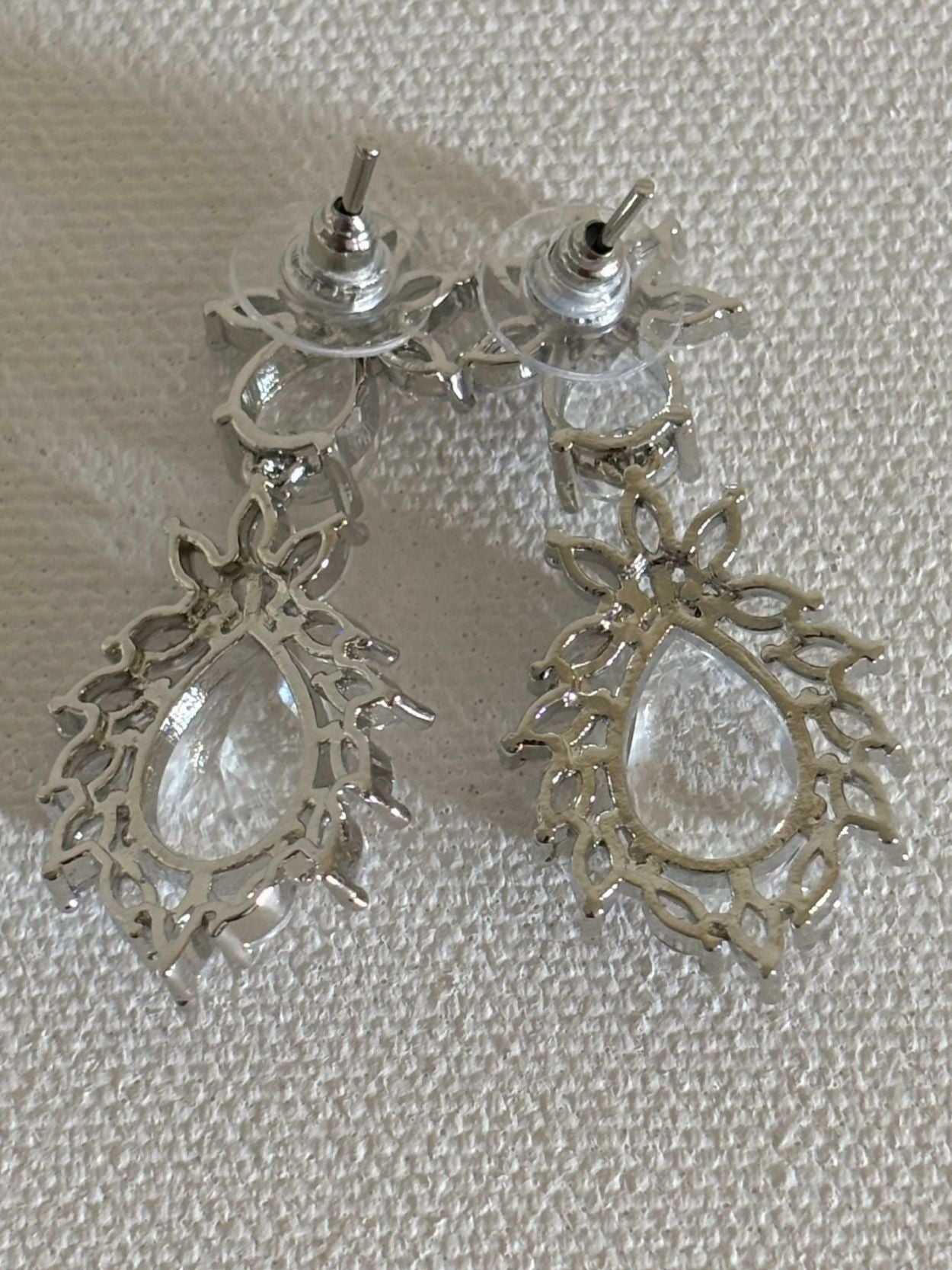 Shop Stylish Double Drop White Stone AD Earrings online. Shop from an exclusive range of zircon earrings, bridal AD jewelry, silver plated earrings, rhodium plated jewellery, AD earrings, AD necklace sets for coats, gowns and lehengas. -back