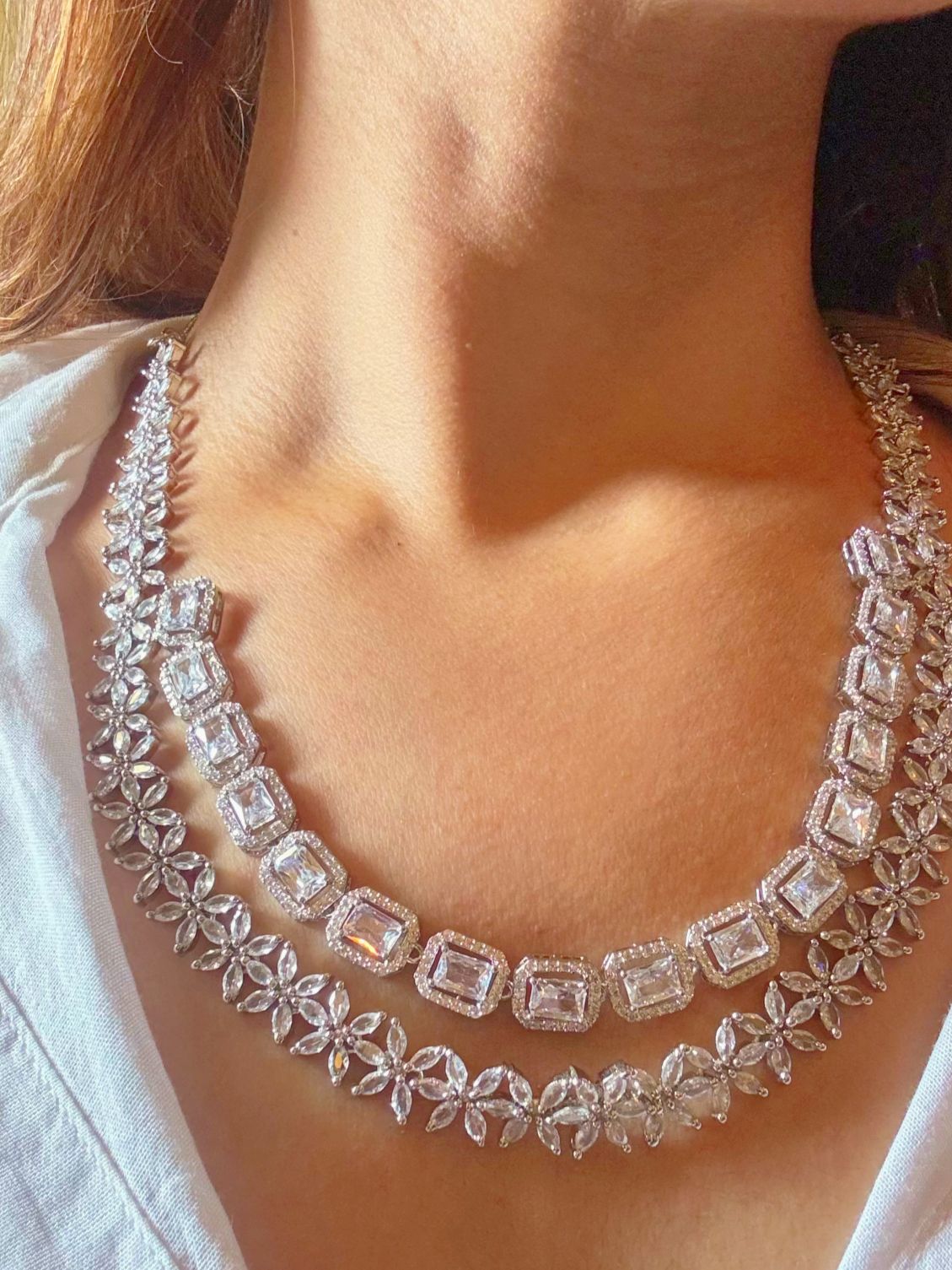 Shop Diamond Look bridal AD Necklace in India. Explore elegant bridal AD jewellery online. Shop premium bridal jewellery sets in Zircon, AD, Kundan, Victorian Diamond. Collection best suited for Indian weddings, parties and special occasions. Choose AD Necklace In White stone for sarees, lehengas and coats. -front