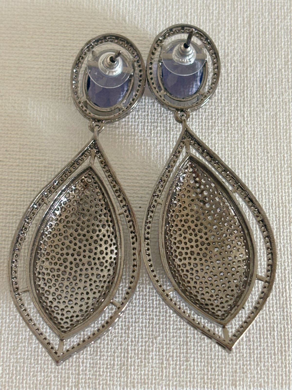 Shop women's Designer Nano Setting AD Earrings With Purple Stone online in India. Shop from an exclusive range of zircon jewellery, bridal wedding jewelry, silver plated earrings, rhodium plated jewellery, AD earrings, AD necklace sets for Lehengas, suits, sarees and gowns. -back