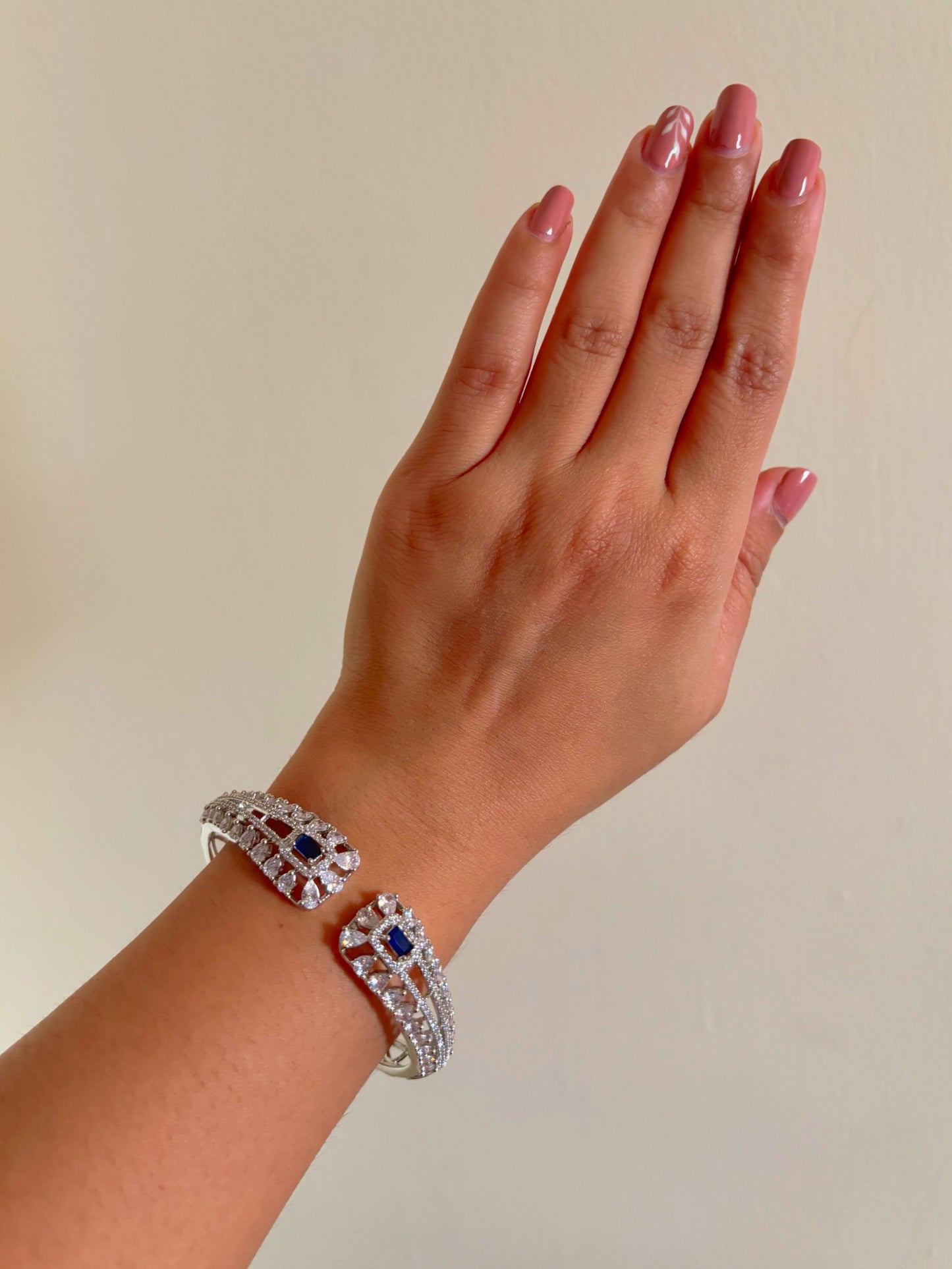 Shop Rihana Rhodium Plated Sleek AD Bracelet In Blue online in India. Shop from an exclusive range of zircon jewellery, bridal wedding jewellery, silver plated earrings, rhodium plated rings, AD rings, AD earrings for weddings, engagement, cocktail night & parties. -front