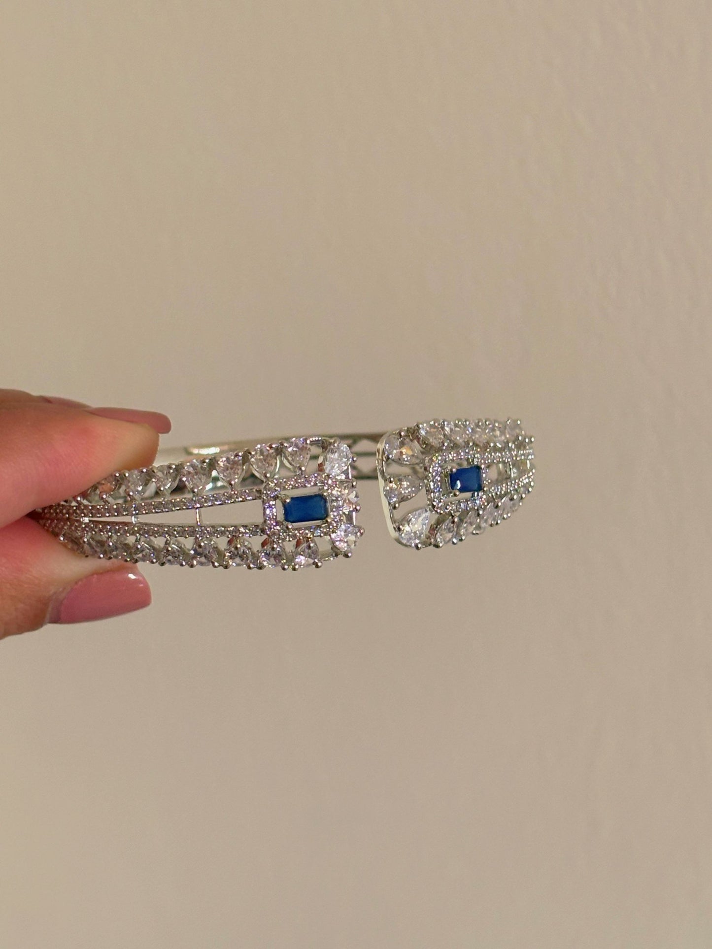 Shop Rihana Rhodium Plated Sleek AD Bracelet In Blue online in India. Shop from an exclusive range of zircon jewellery, bridal wedding jewellery, silver plated earrings, rhodium plated rings, AD rings, AD earrings for weddings, engagement, cocktail night & parties. -first