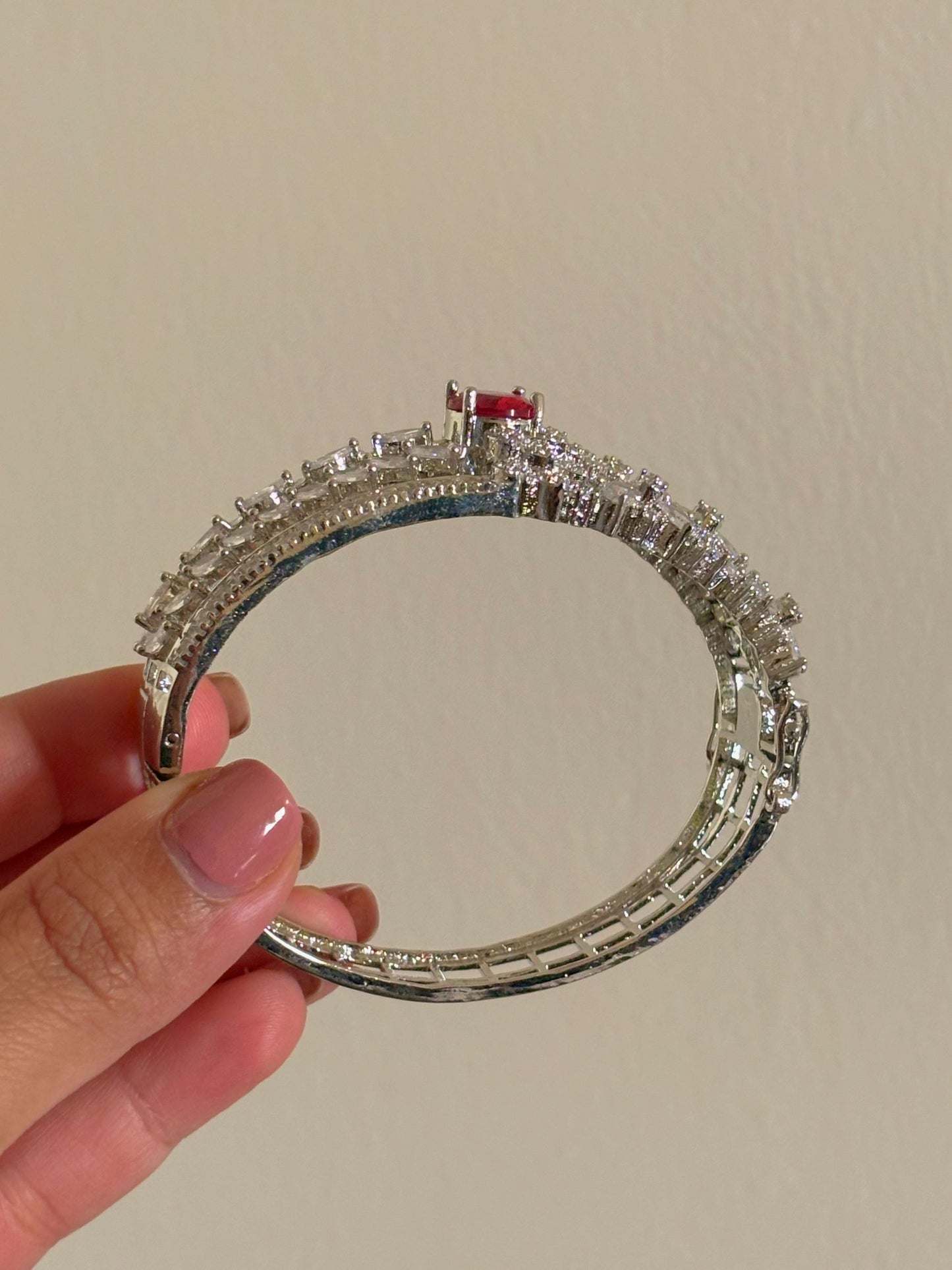 Shop Ruby Red Statement Bracelet in AD online in India. Shop from an exclusive range of zircon jewellery, bridal wedding jewellery, silver plated earrings, rhodium plated rings, AD rings, AD earrings for weddings, engagement, cocktail night & parties. -side