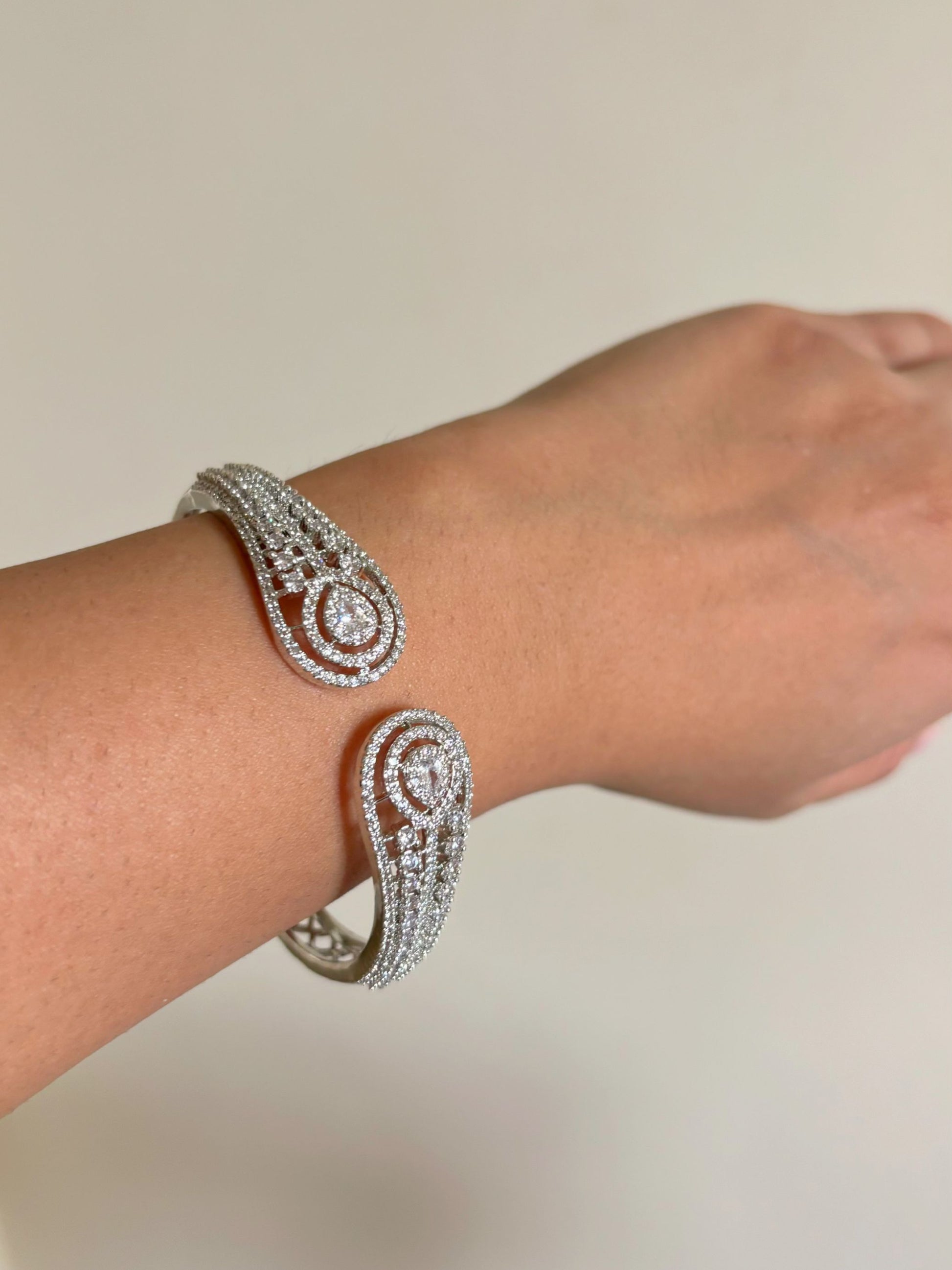 Shop Sleek Celebrity Look AD Bracelet In Rhodium Polish online in India. Shop from an exclusive range of zircon jewellery, bridal wedding jewellery, silver plated earrings, rhodium plated rings, AD rings, AD earrings for weddings, engagement, cocktail night & parties. -side