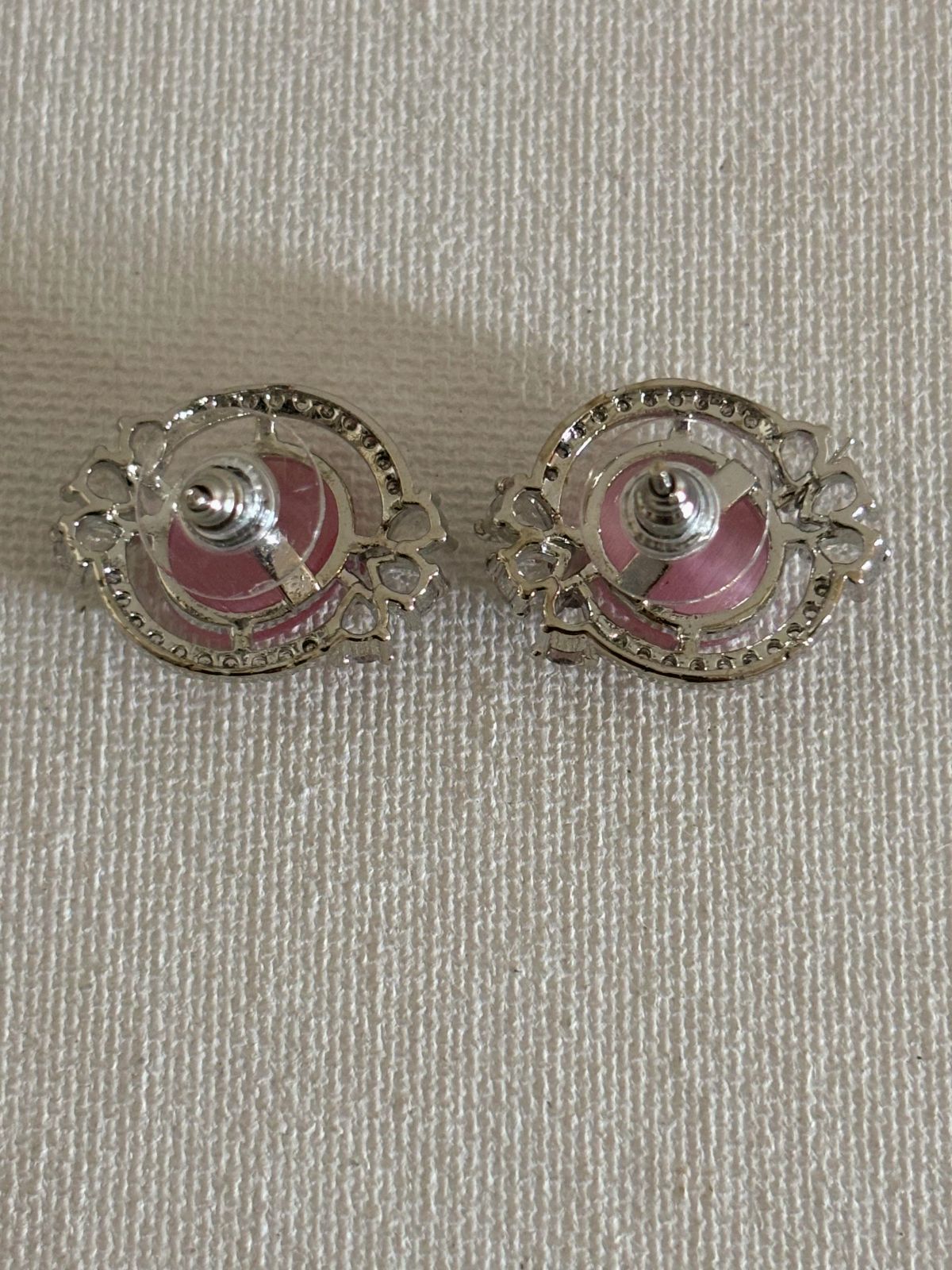 Shop Celebrity Studs In AD & Pink stone online. Shop from an exclusive range of zircon earrings, bridal AD jewelry, silver plated earrings, rhodium plated jewellery, AD earrings, AD necklace sets for weddings, engagements and parties. -back