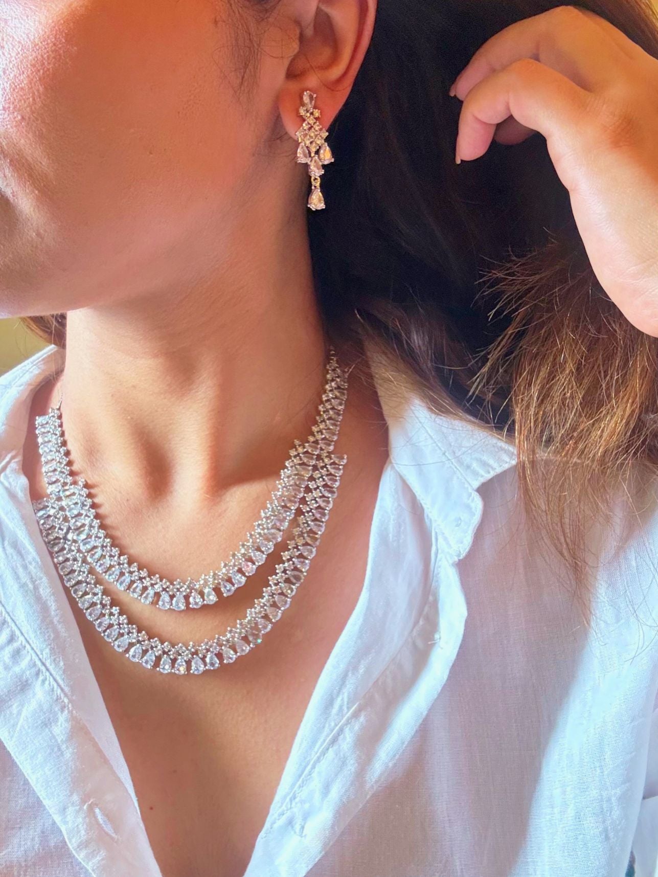 Shop Diamond Look bridal AD Necklace in India. Explore elegant bridal AD jewellery online. Shop premium bridal jewellery sets in Zircon, AD, Kundan, Victorian Diamond. Collection best suited for Indian weddings, parties and special occasions. Choose Diamond AD strings for sarees, lehengas and coats. Side2