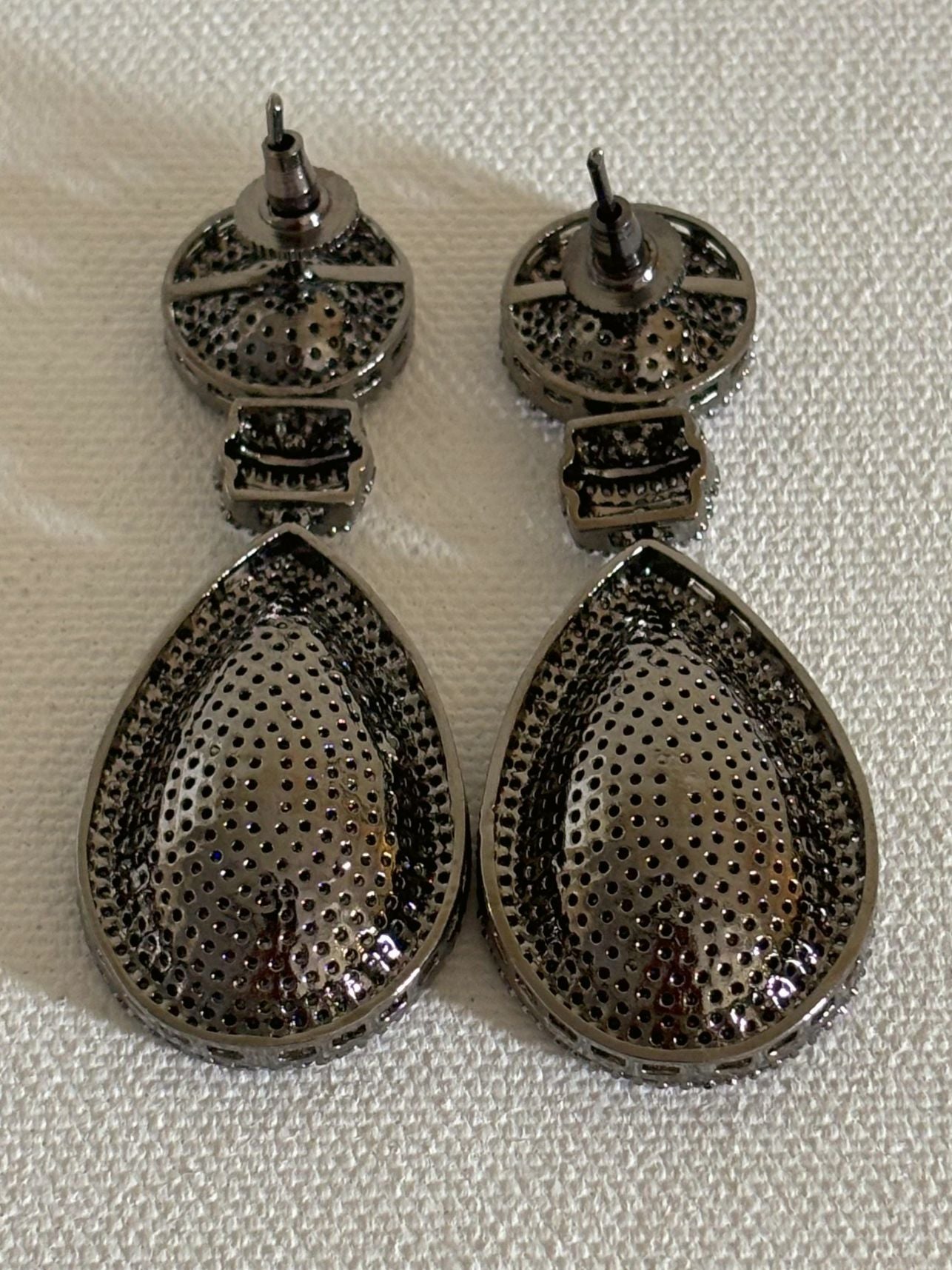 Shop women's Long Nano Setting AD Earrings In Pink online in India. Shop from an exclusive range of zircon jewellery, bridal wedding jewelry, silver plated earrings, rhodium plated jewellery, AD earrings, AD earrings sets for office parties, cocktail dresses and sangeet night. -back