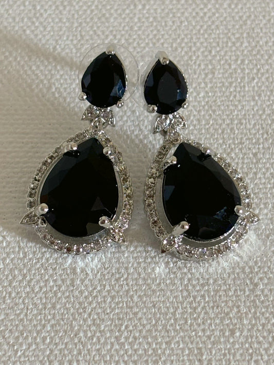 Shop Celebrity Look Double Drop Black Stone AD Earrings online. Shop from an exclusive range of zircon earrings, bridal AD jewelry, silver plated earrings, rhodium plated jewellery, AD earrings, AD necklace sets for coats, gowns and lehengas. -front