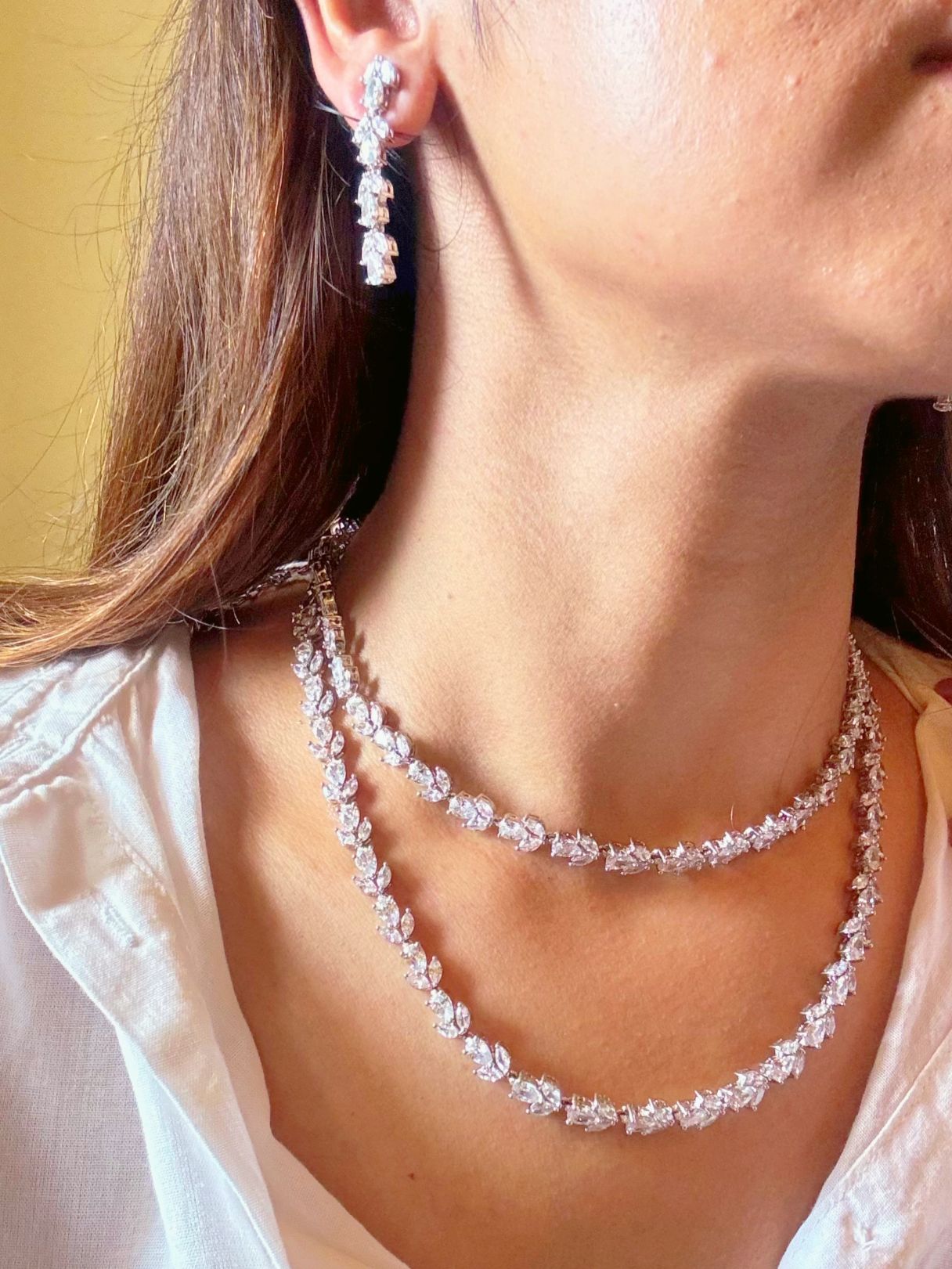 Shop Diamond AD String Necklace in India. Explore elegant bridal AD jewellery online. Shop premium bridal jewellery sets in Zircon, AD, Kundan, Victorian Diamond. Collection best suited for Indian weddings, parties and special occasions. Choose Diamond AD strings for sarees, lehengas and coats. -Side