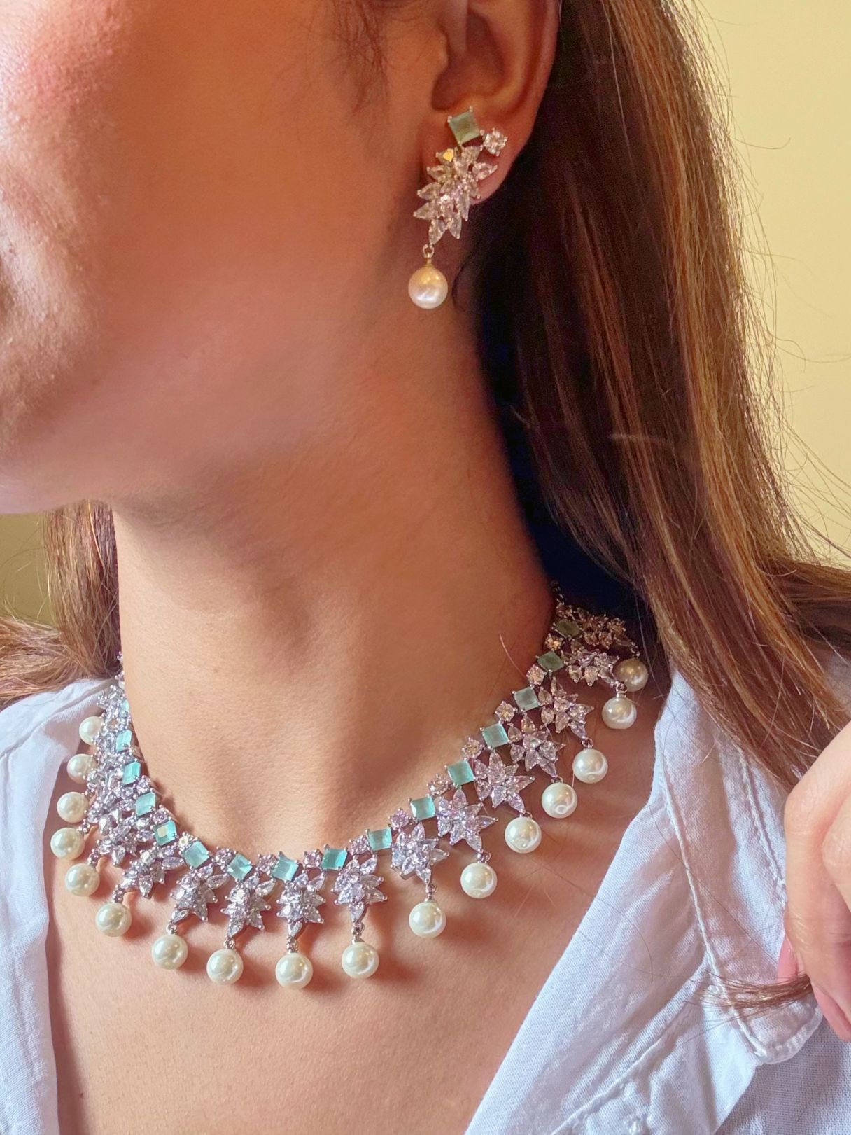 Shop Diamond Look AD Necklace in India. Explore elegant bridal AD jewellery online. Shop premium bridal jewellery sets in Zircon, AD, Kundan, Victorian Diamond. Collection best suited for Indian weddings, parties and special occasions. Choose Diamond AD strings for sarees, lehengas and coats. -Side2