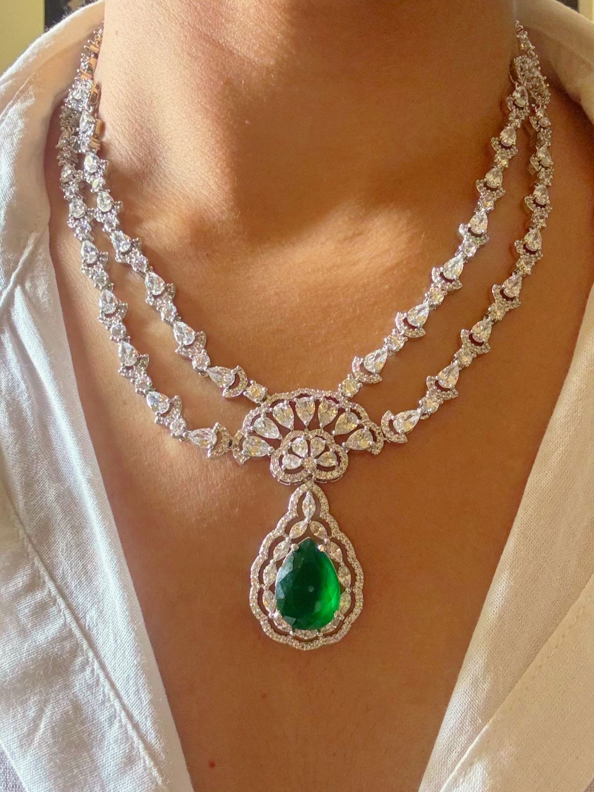 Shop Green Stone AD Necklace online in India. Perfect for brides and bridesmaid seeking elegant bridal AD jewellery online. Explore premium bridal jewellery sets in Zircon, AD, Kundan, Victorian Diamond. Collection ideal for Indian weddings, parties and special occasions. -Earrings