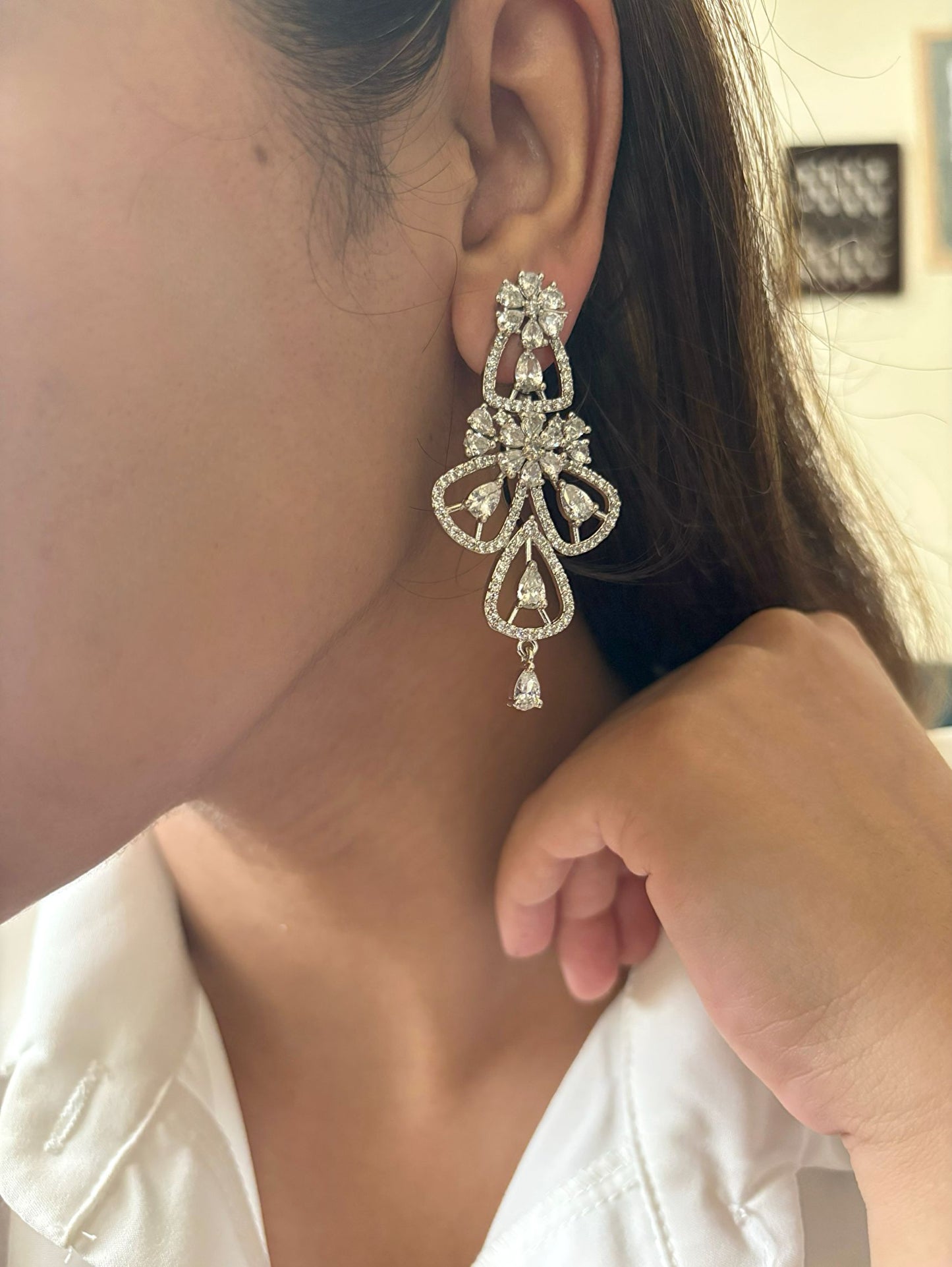 Shop women's Flower Shaped Long AD Earrings In White online in India. Shop from an exclusive range of zircon jewellery, Indian wedding jewelry, gold plated earrings, rhodium plated jewellery, AD earrings, AD necklace sets for weddings, engagements and parties. -second