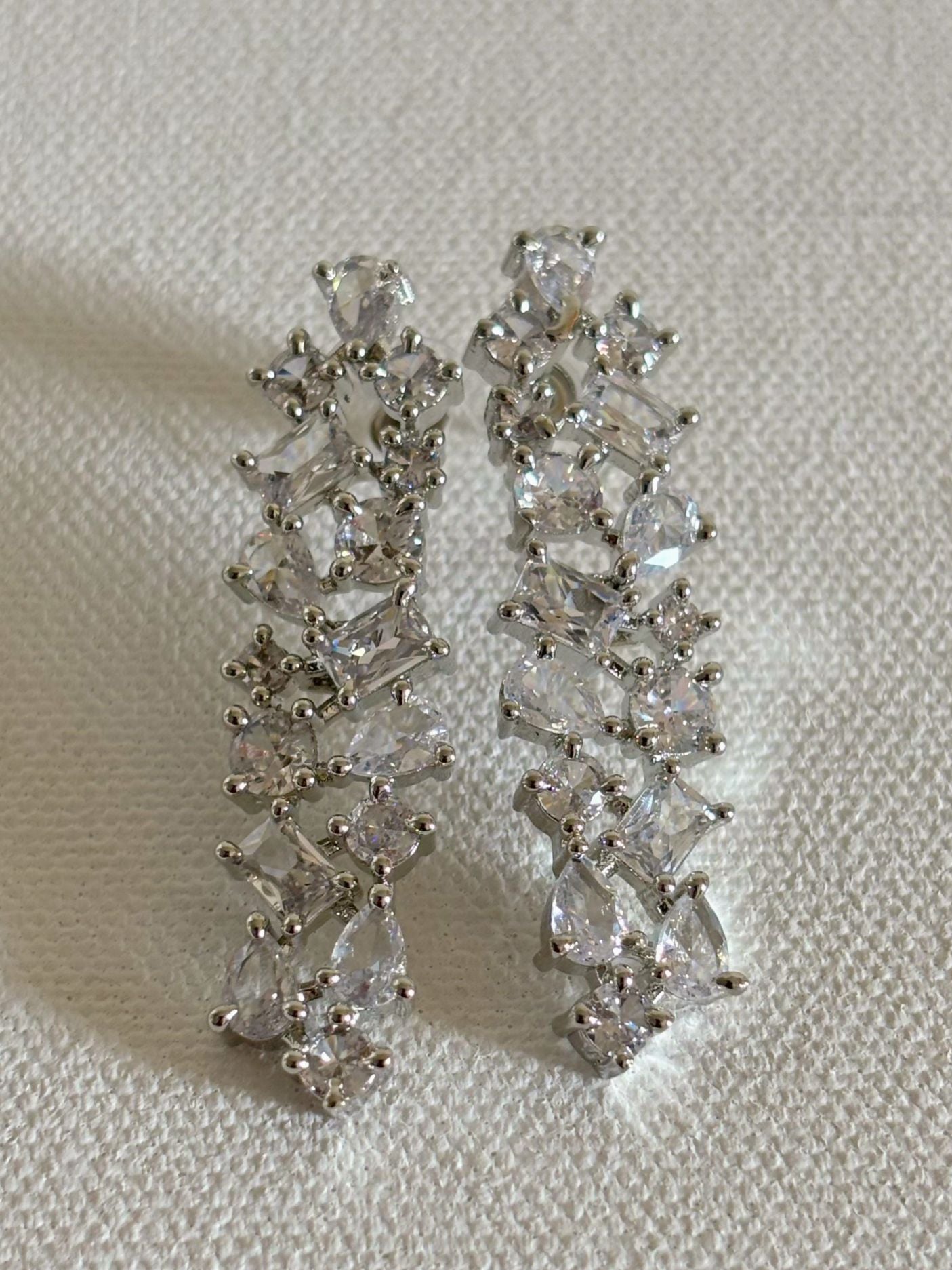 Shop Celebrity Look Long AD Earrings In White online in India. Shop from an exclusive range of zircon jewellery, bridal wedding jewelry, silver plated earrings, rhodium plated jewellery, AD earrings, AD necklace sets for Lehengas, suits, sarees and gowns. -first