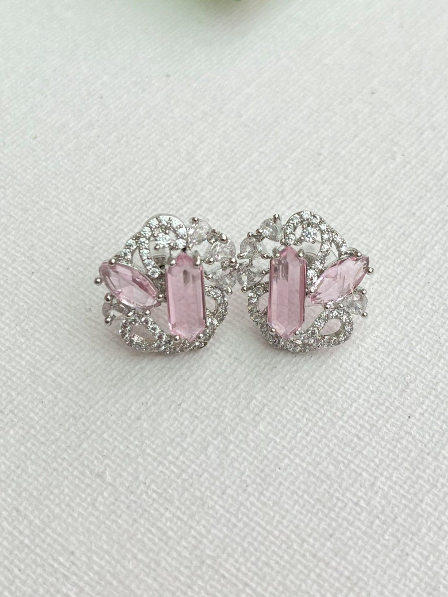 Shop Gauri Pink Stud Earrings In AD online in India. Shop AD earrings, bridal AD jewelry, AD necklace sets for weddings, engagements and parties.