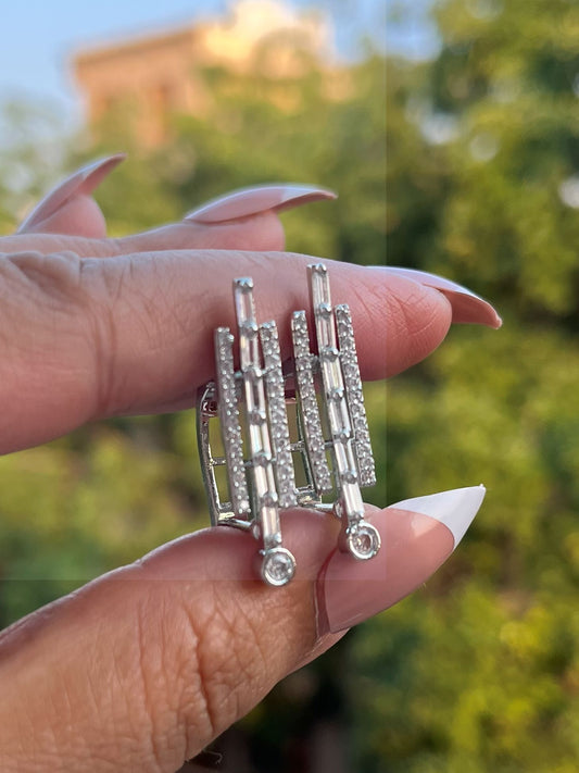 Shop Office Wear Rhodium Polish Baguette AD Earrings online in India. Shop from an exclusive range of zircon jewellery, Indian wedding jewelry, gold plated earrings, rhodium plated jewellery, AD earrings, AD necklace sets for weddings, engagements and parties. -front