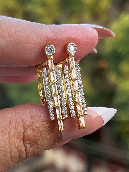 Shop Office Wear Gold Polish Baguette AD Earrings online in India. Shop from an exclusive range of zircon jewellery, Indian wedding jewelry, gold plated earrings, rhodium plated jewellery, AD earrings, AD necklace sets for weddings, engagements and parties.  -front