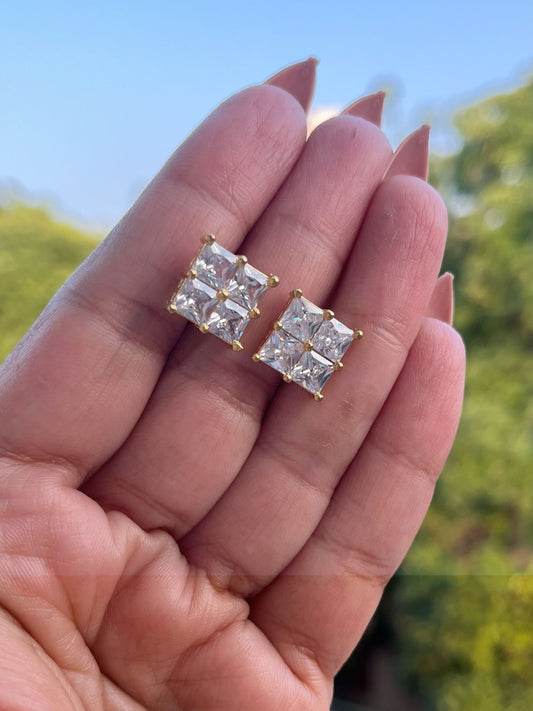 Shop Old Money Charm Square AD Studs Earrings online in India. Shop from an exclusive range of zircon jewellery, Indian wedding jewelry, gold plated earrings, rhodium plated jewellery, AD earrings, AD necklace sets for weddings, engagements and parties. -front