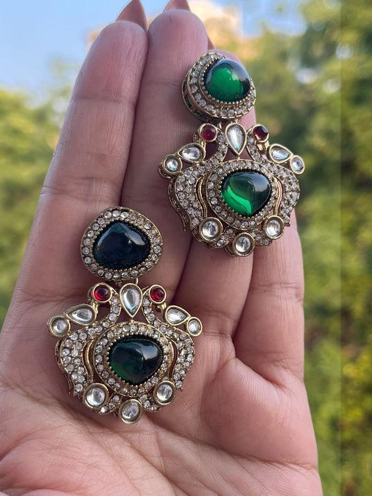 Shop Devika Traditional Green Glass Stone Earrings In AD online in India. Shop from an exclusive range of CZ jewellery, gold plated, silver, mehendi polish earrings. -front