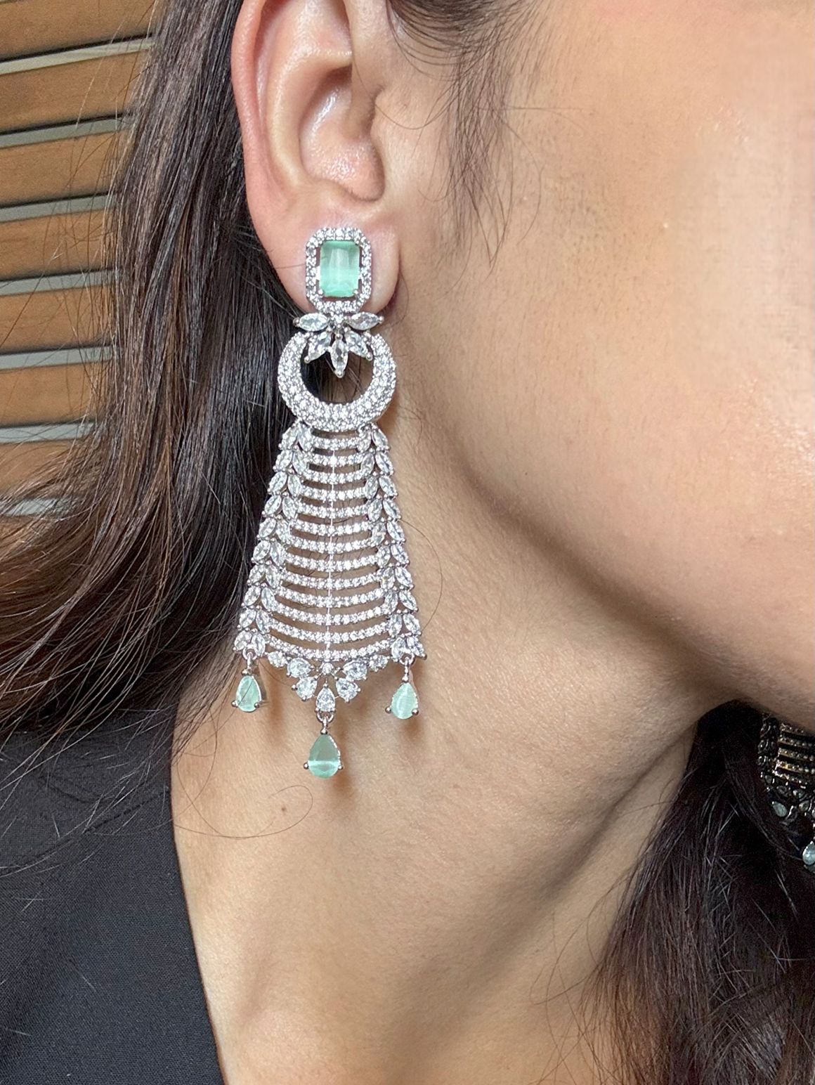 Shop Lyra Long Chandelier AD Earrings In Mint Green Stone online in India. Shop from an exclusive range of CZ jewellery, gold plated, silver, mehendi polish earrings.