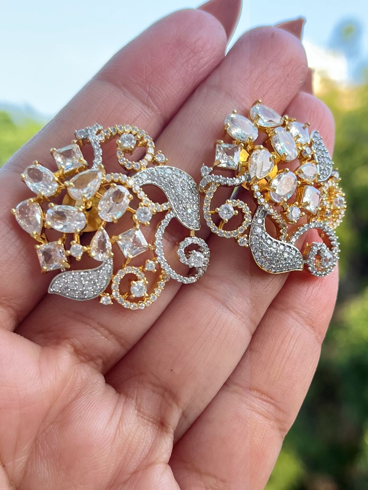 Shop Premium Floral CZ Stones Stud Earrings online in India. Shop AD earrings, bridal AD jewelry, AD necklace sets for weddings, engagements and parties.