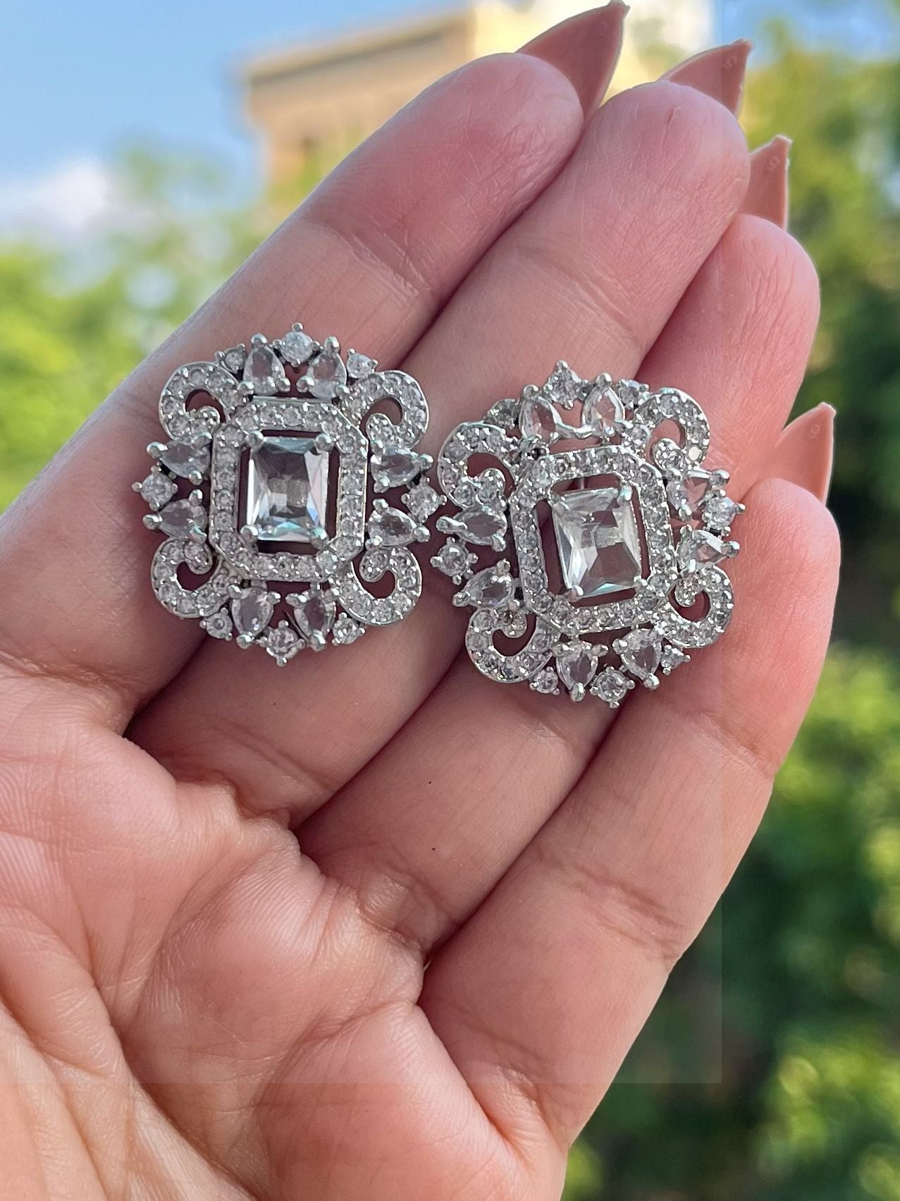 Shop Premium CZ Stones Stud Earrings In White online in India. Shop AD earrings, bridal AD jewelry, AD necklace sets for weddings, engagements and parties.
