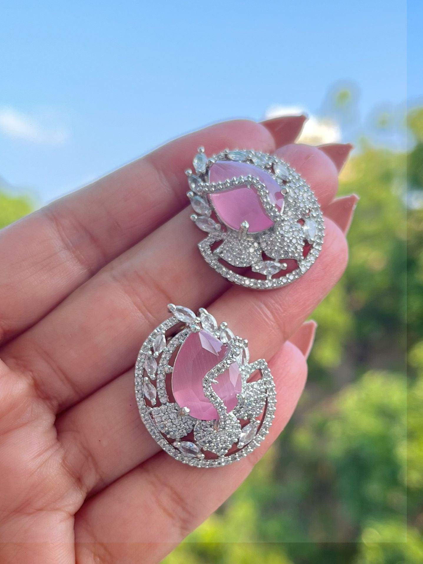 Shop Hania Premium CZ Stones Big Stud Earrings In Pink online in India. Shop AD earrings, bridal AD jewelry, AD necklace sets for weddings, engagements and parties.