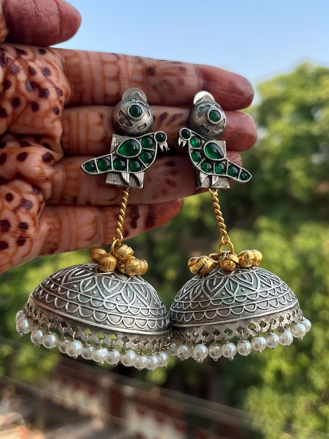 Buy Zoya Bird Motive Oversized Dual Tone Jhumka Earrings online in India. Shop oxidized jewellery for festivals and office and daily wearing in affordable range.