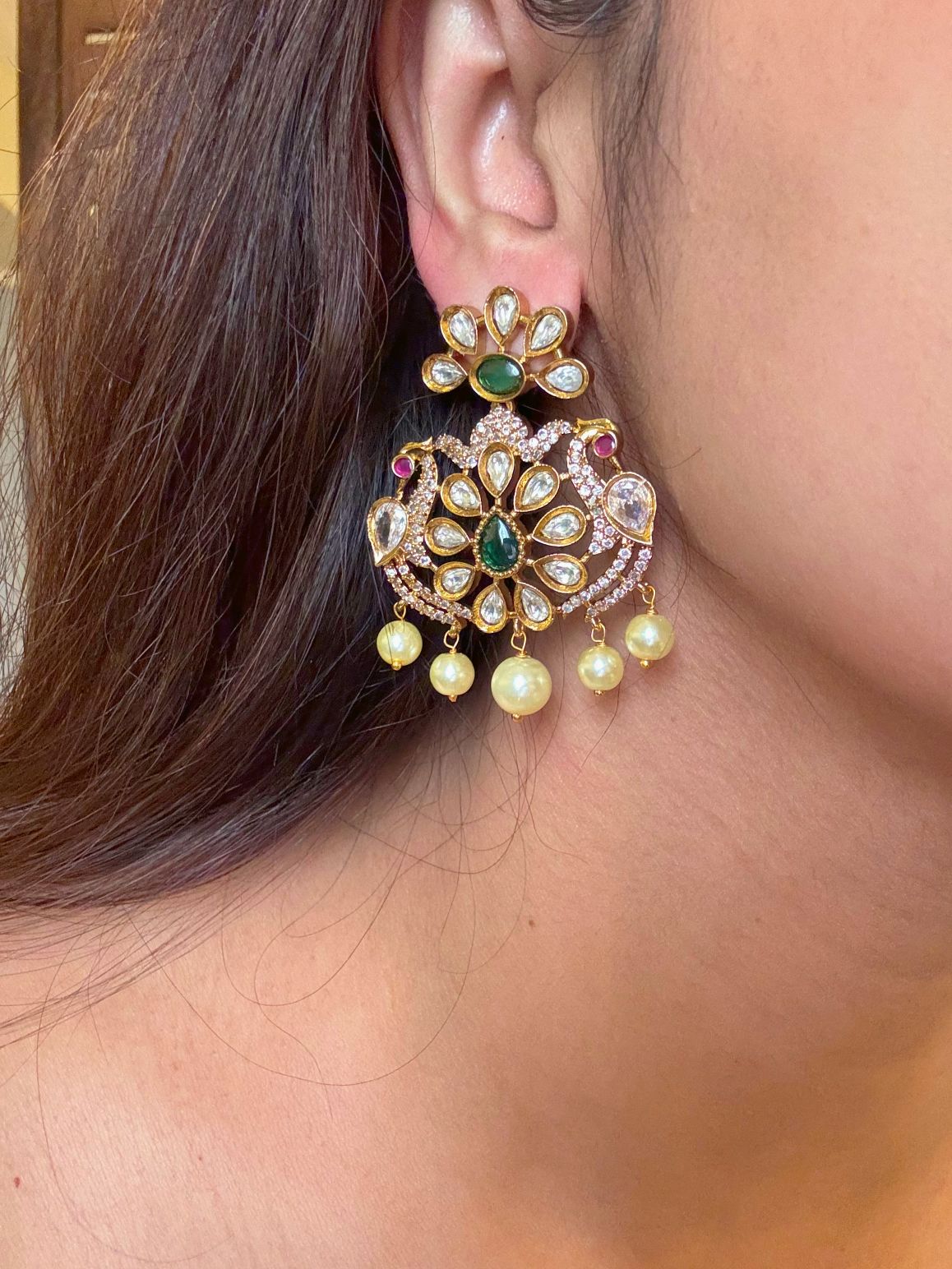 Shop Raagni Kundan Green Heavy Earrings With Pearl Drops online in India. Shop from an exclusive range of CZ jewellery, gold plated, silver, mehendi polish earrings. -first