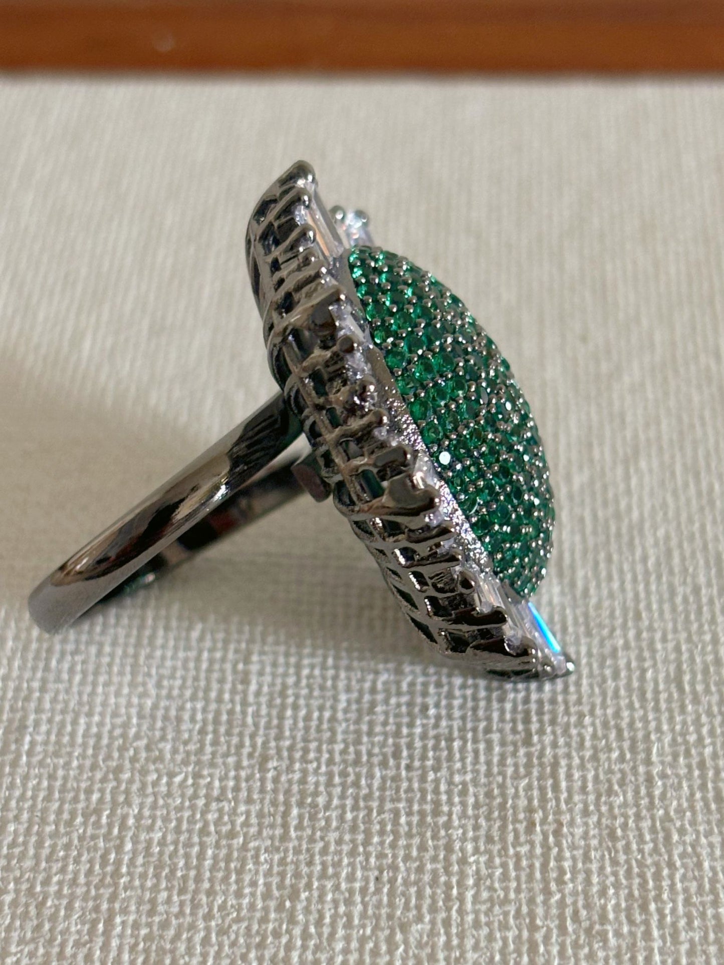 Shop Nano Setting Green Stone Cocktail AD Ring online in India. Shop from an exclusive range of zircon jewellery, bridal wedding jewellery, silver plated earrings, rhodium plated rings, AD rings, AD earrings for office parties, cocktail dresses and sangeet night. -back