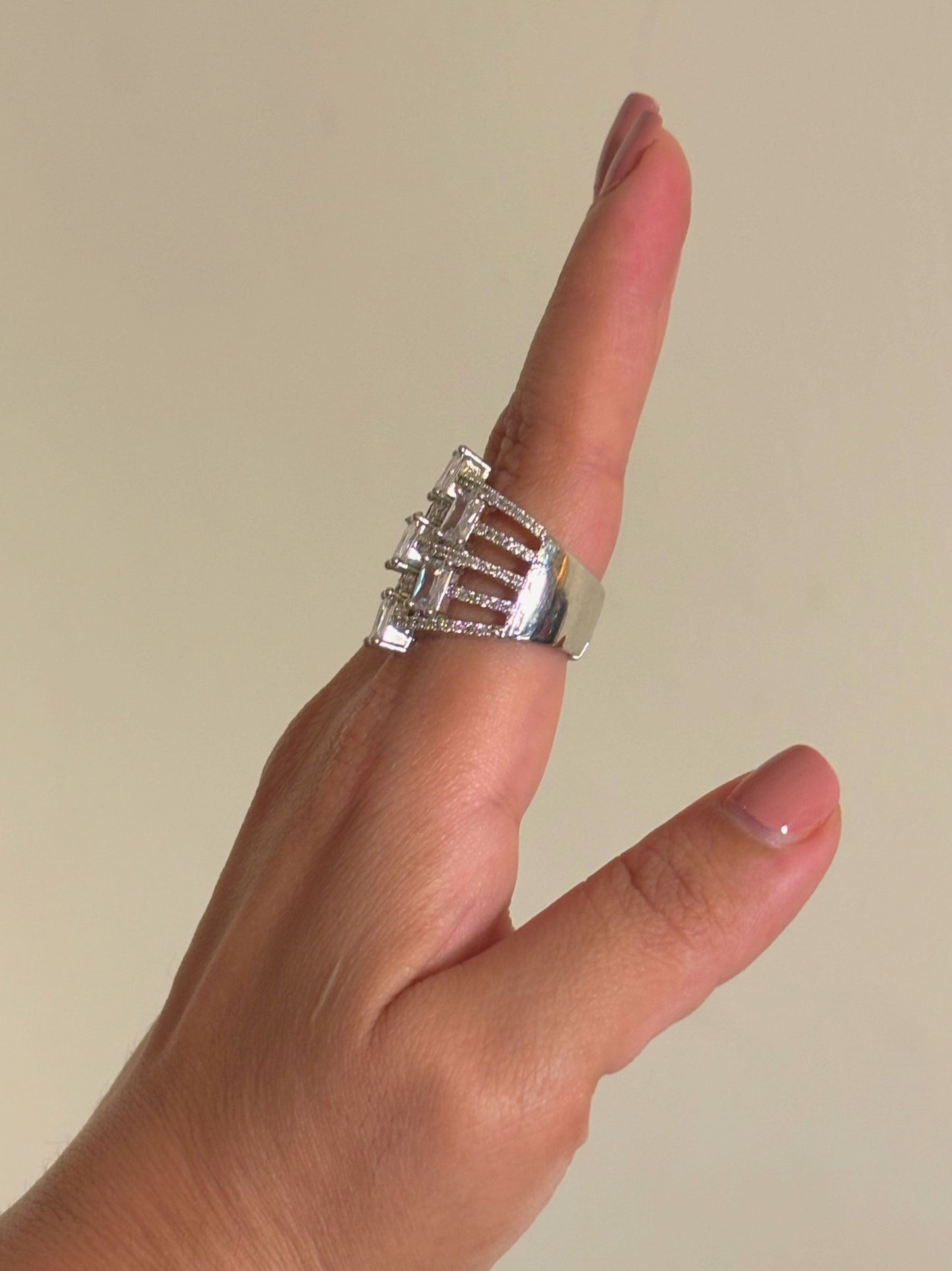 Shop Designer Baguette AD Cocktail Ring online in India. Shop from an exclusive range of zircon jewellery, bridal wedding jewellery, silver plated earrings, rhodium plated rings, AD rings, AD earrings for office parties, cocktail dresses and sangeet night. -side