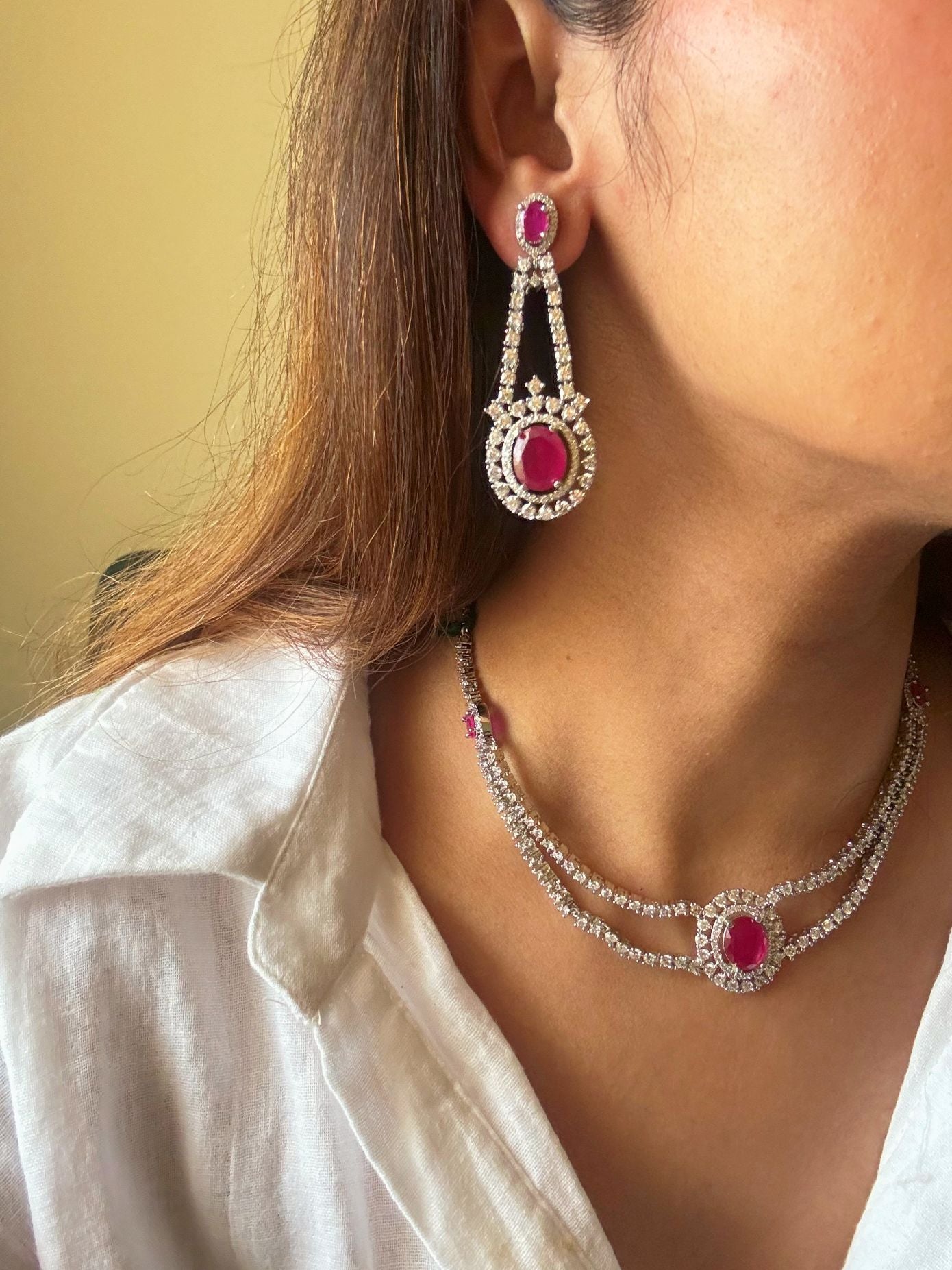 Shop Festive Look AD Set In Ruby Stone in India. Explore elegant bridal AD jewellery online. Shop premium bridal jewellery sets in Zircon, AD, Kundan, Victorian Diamond. Collection best suited for Indian weddings, parties and special occasions. Choose AD Necklace in red stone for sarees, lehengas and coats. -side