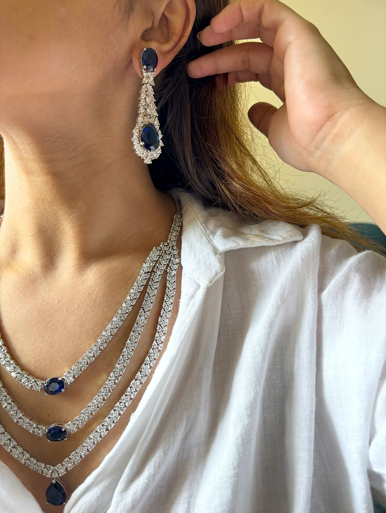 Shop Premium Three Layer AD Set In Sapphire Stone online in India. Explore elegant bridal AD jewellery online. Shop premium bridal jewellery sets in Zircon, AD, Kundan, Victorian Diamond. Collection best suited for Indian weddings, parties and special occasions. Choose AD Necklace in blue stone for sarees, lehengas and gowns. -last