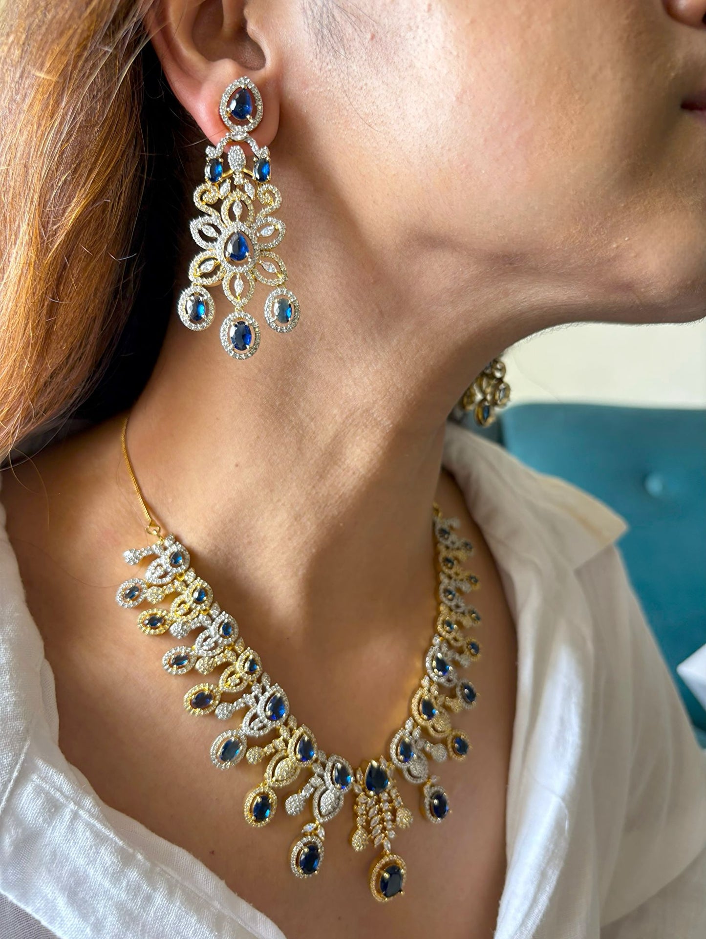 Shop Royal Sapphire Stone Heavy Necklace In AD With Gold & Rhodium Plating online in India. Explore elegant bridal AD jewellery online. Shop premium bridal jewellery sets in Zircon, AD, Kundan, Victorian Diamond. Collection best suited for Indian weddings, parties and special occasions. Choose AD Necklace in blue stone for sarees, lehengas and gowns. -third