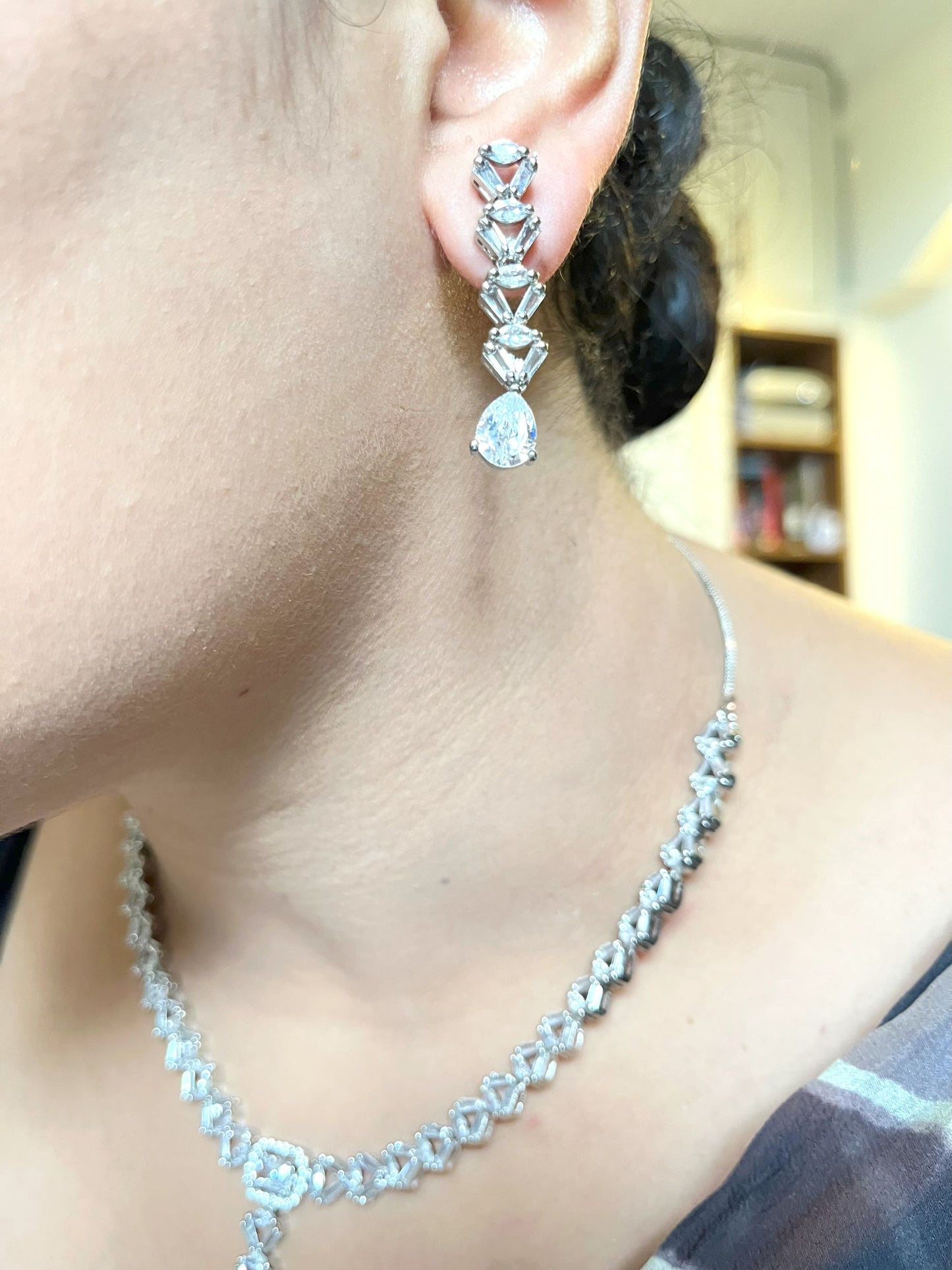 Shop Celebrity Look Party Set With Solitaire Drop In AD online in India. Explore elegant bridal AD jewellery online. Shop premium bridal jewellery sets in Zircon, AD, Kundan, Victorian Diamond. Collection best suited for Indian weddings, parties and special occasions. Buy light wear sets for sarees, lehengas and gowns. -withearrings