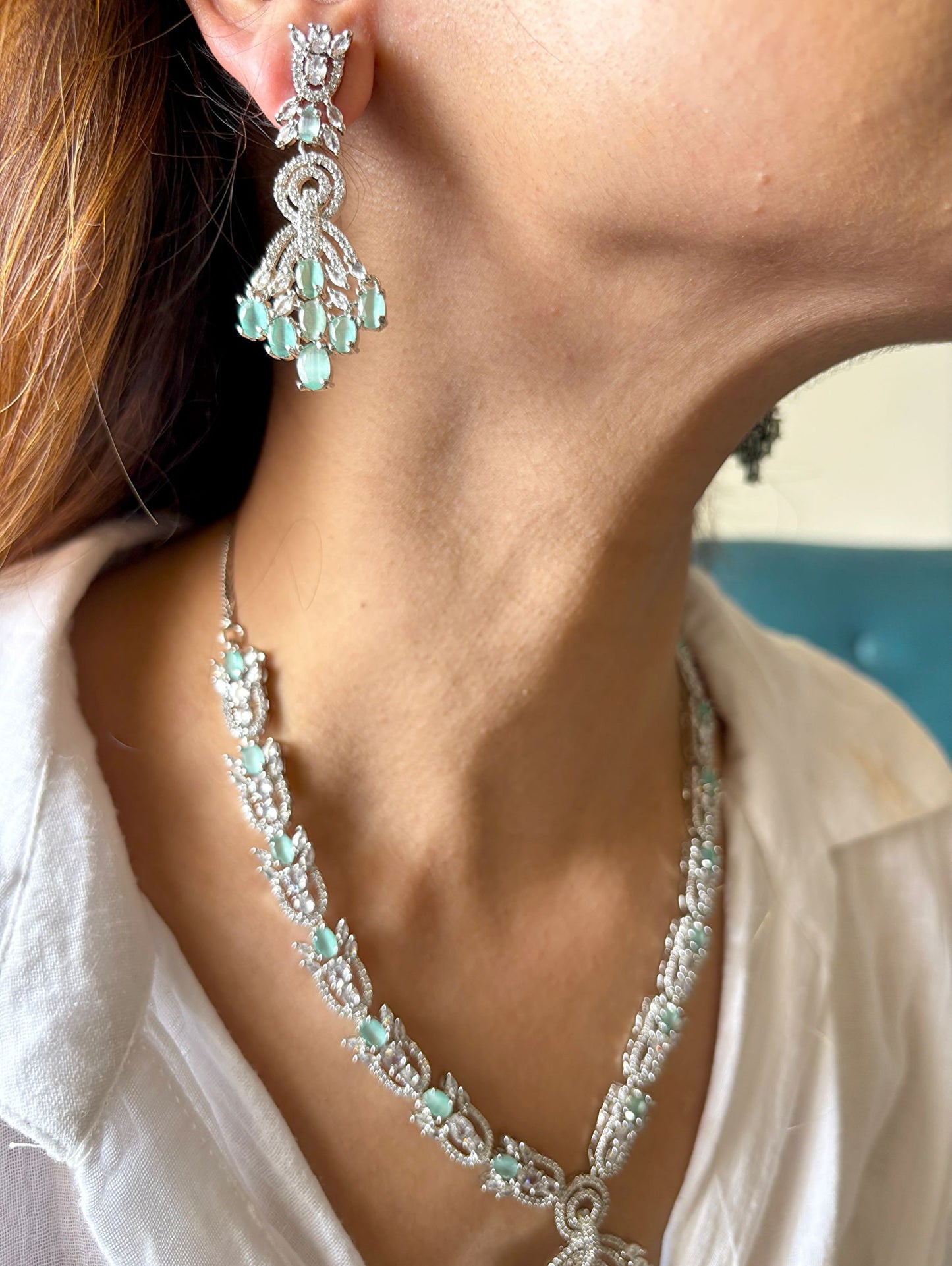 Shop NL25A032 Royal Mint Green Doublet Stone Heavy Necklace In AD online in India. Explore elegant bridal AD jewellery online. Shop premium bridal jewellery sets in Zircon, AD, Kundan, Victorian Diamond. Collection best suited for Indian weddings, parties and special occasions. Choose AD Necklace in pink stone for sarees, lehengas and gowns. -side